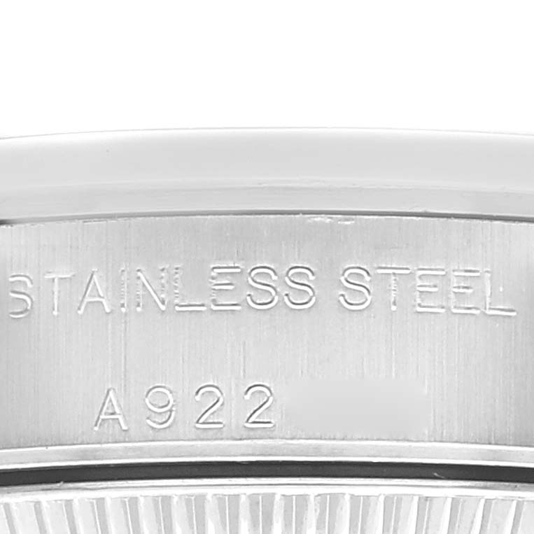 This image shows a close-up of the stainless steel case back of a Rolex Datejust 76080 Women's Stainless Steel Pink Dial 76080 Women's Stainless Steel Pink Dial watch.