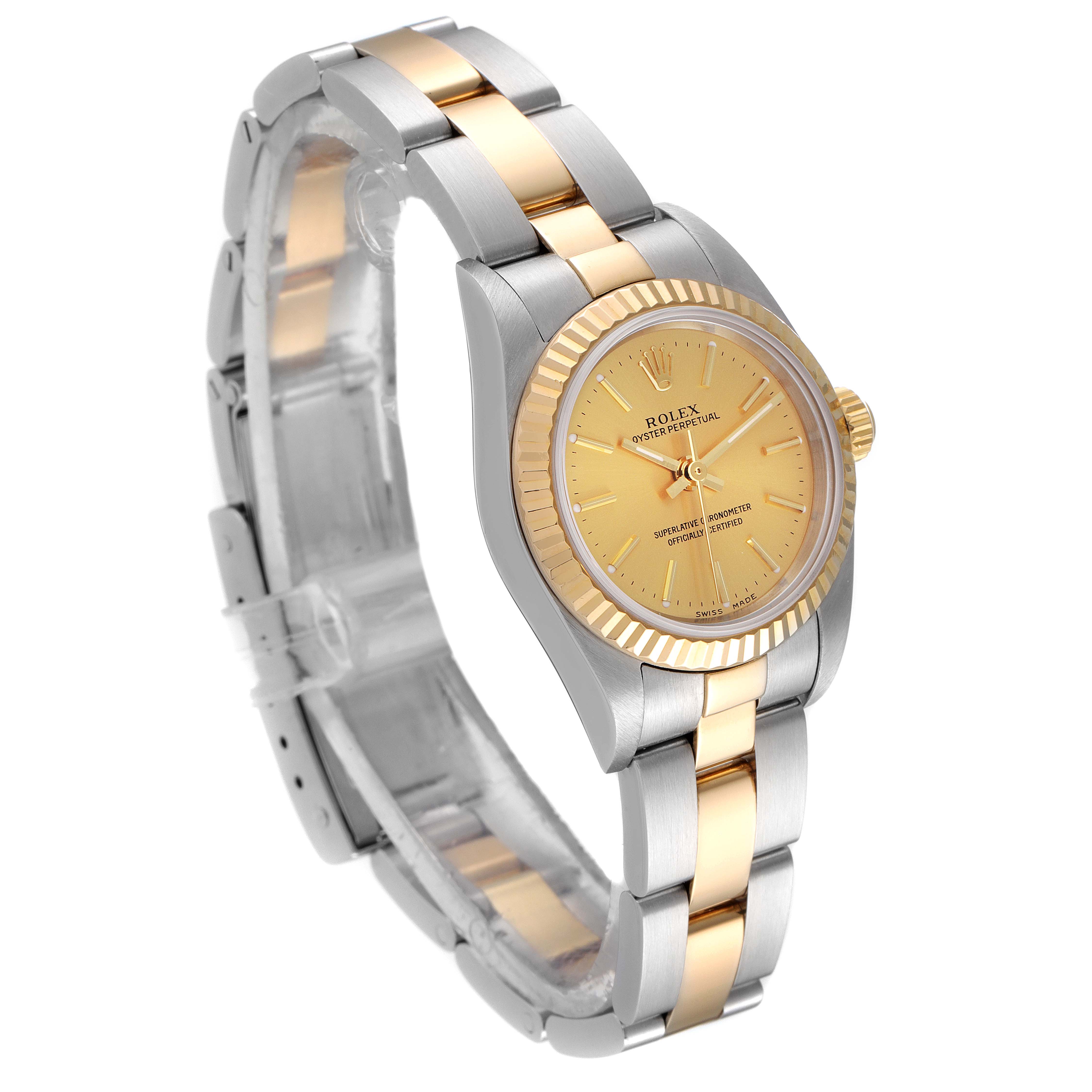 The Rolex Oyster Perpetual 76193 Women's Steel and Gold (two tone) Champagne Dial 76193 Women's Steel and Gold (two tone) Champagne Dial watch is shown at a three-quarter angle, highlighting the dial, bezel, and bracelet.