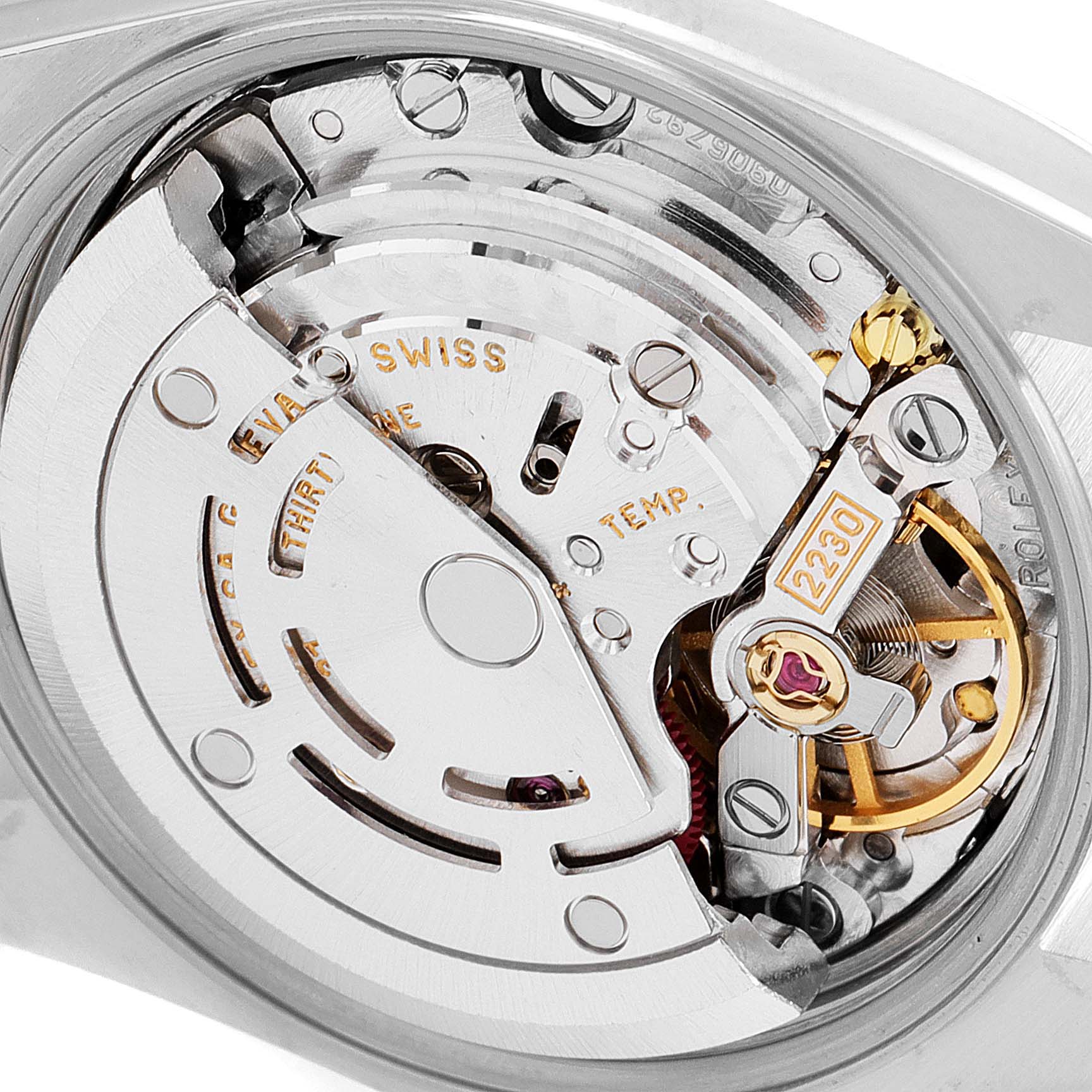 This image shows the internal movement components of a Rolex Oyster Perpetual 76193 Women's Steel and Gold (two tone) Champagne Dial 76193 Women's Steel and Gold (two tone) Champagne Dial watch, taken from a close-up angle.