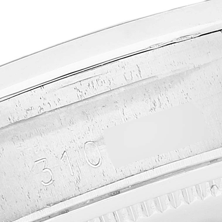 This close-up angle shows the engraved serial number on the side of the case of a Rolex Vintage Collection 6694 Men's Stainless Steel Black Dial 6694 Men's Stainless Steel Black Dial model watch.