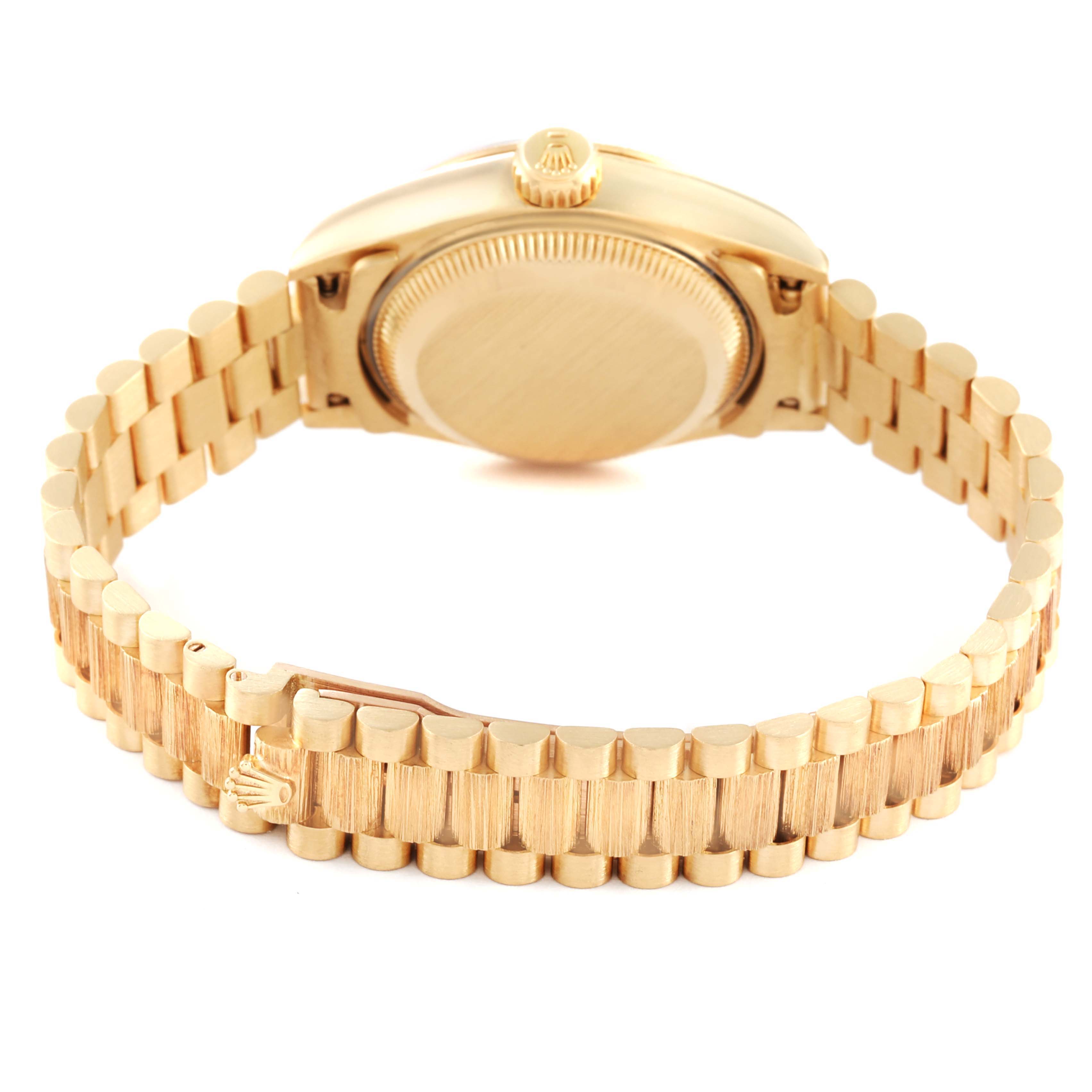 The image shows the Rolex President 69278 Women's Yellow Gold Champagne Dial 69278 Women's Yellow Gold Champagne Dial model watch from the back, highlighting the bracelet and case back.