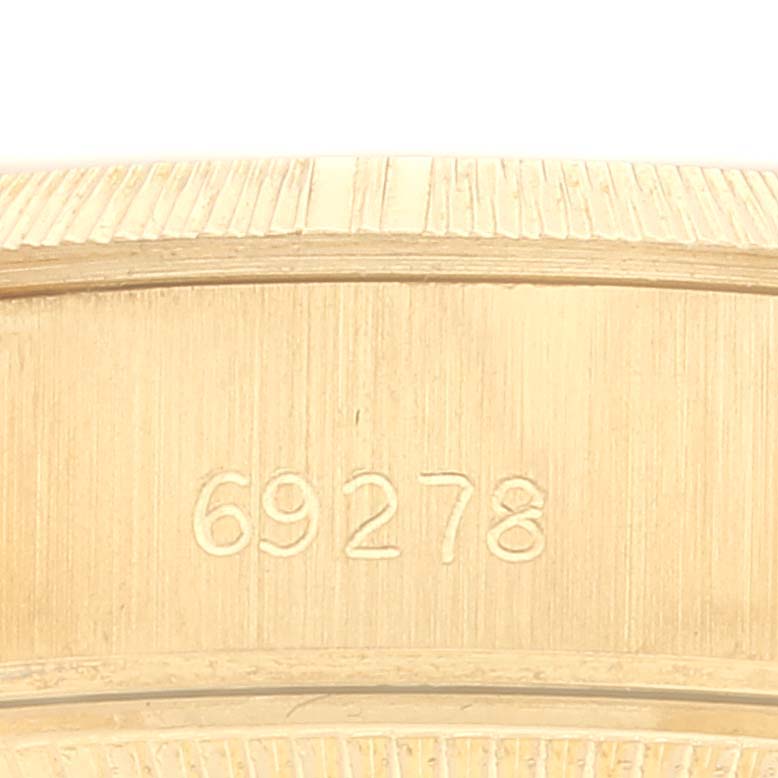 This is a close-up of the model number "69278" engraved on the case of a Rolex President 69278 Women's Yellow Gold Champagne Dial 69278 Women's Yellow Gold Champagne Dial watch.