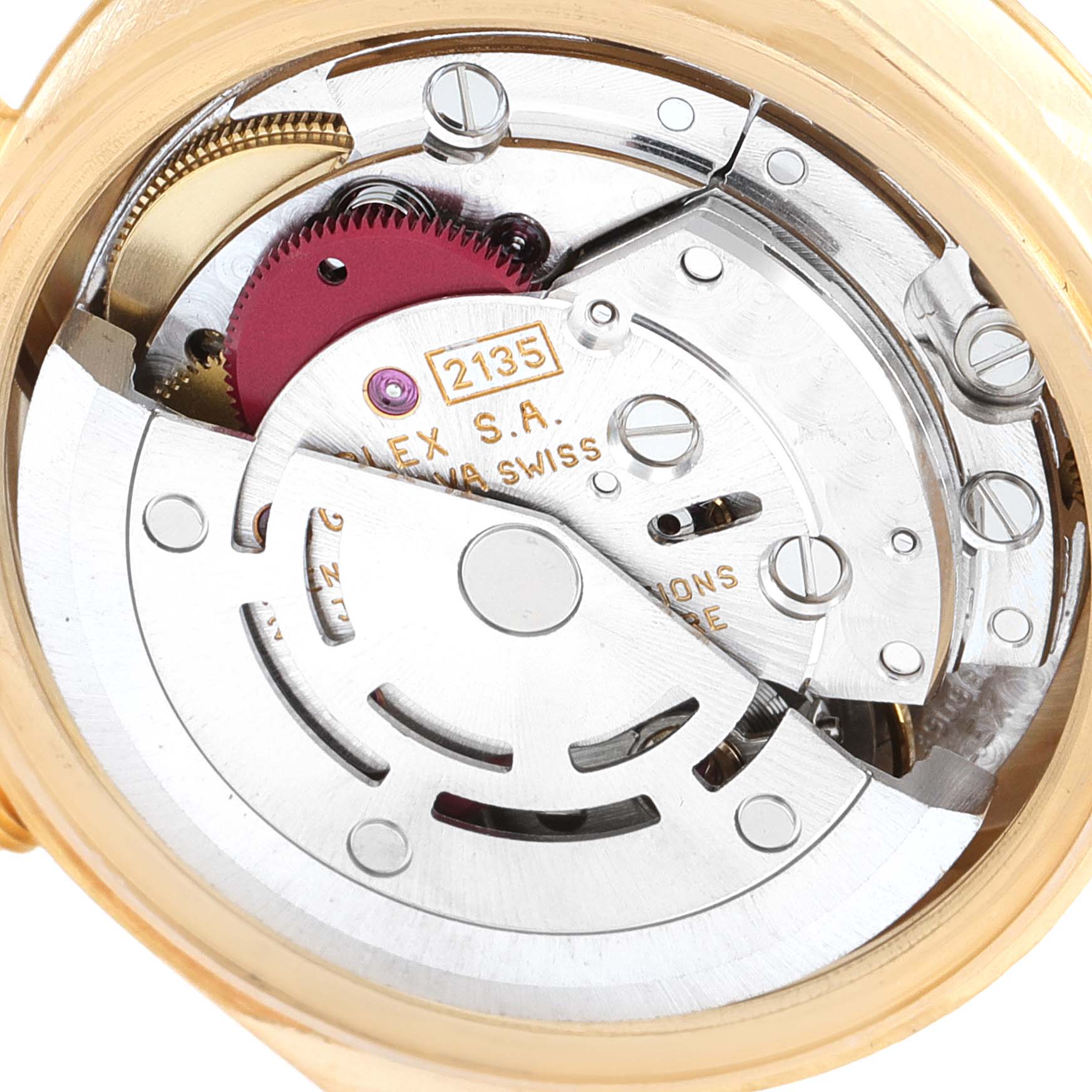This image shows the movement mechanism of a Rolex President 69178 Women's Yellow Gold Beige Dial 69178 Women's Yellow Gold Beige Dial model watch from the back, highlighting intricate gears and components.