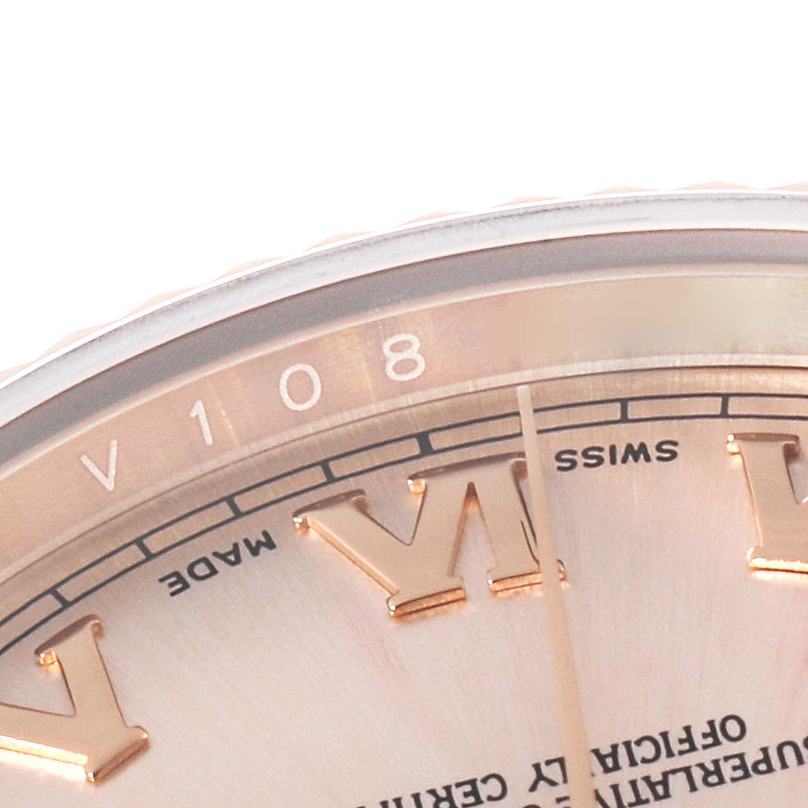 The image shows a close-up of the dial and part of the bezel of a Rolex President 118235 Men's Rose Gold Pink Dial 118235 Men's Rose Gold Pink Dial model watch.