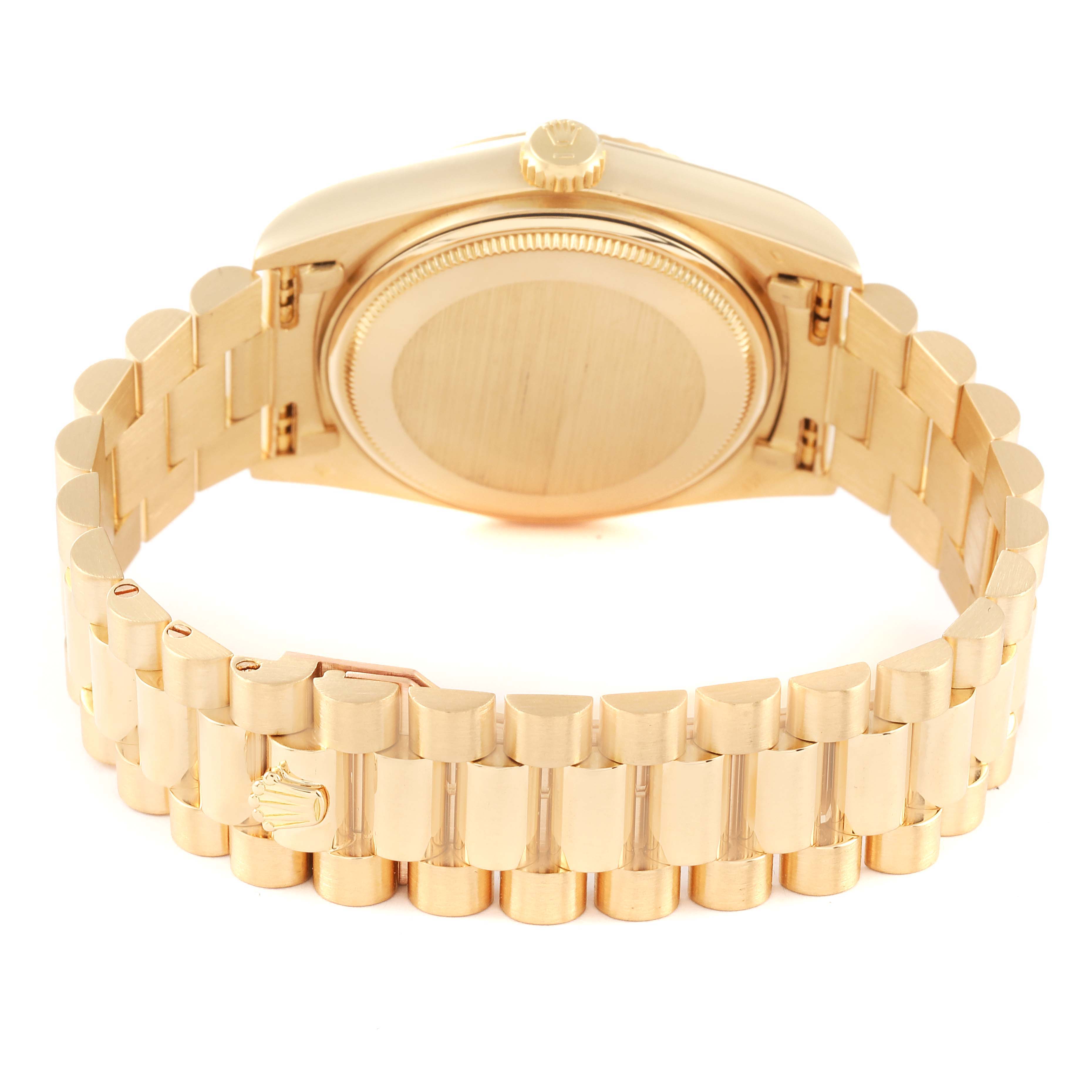 This image shows the back case and bracelet of a Rolex President 18038 Men
s Yellow Gold White Dial 18038 Men
s Yellow Gold White Dial model watch from a rear angle.