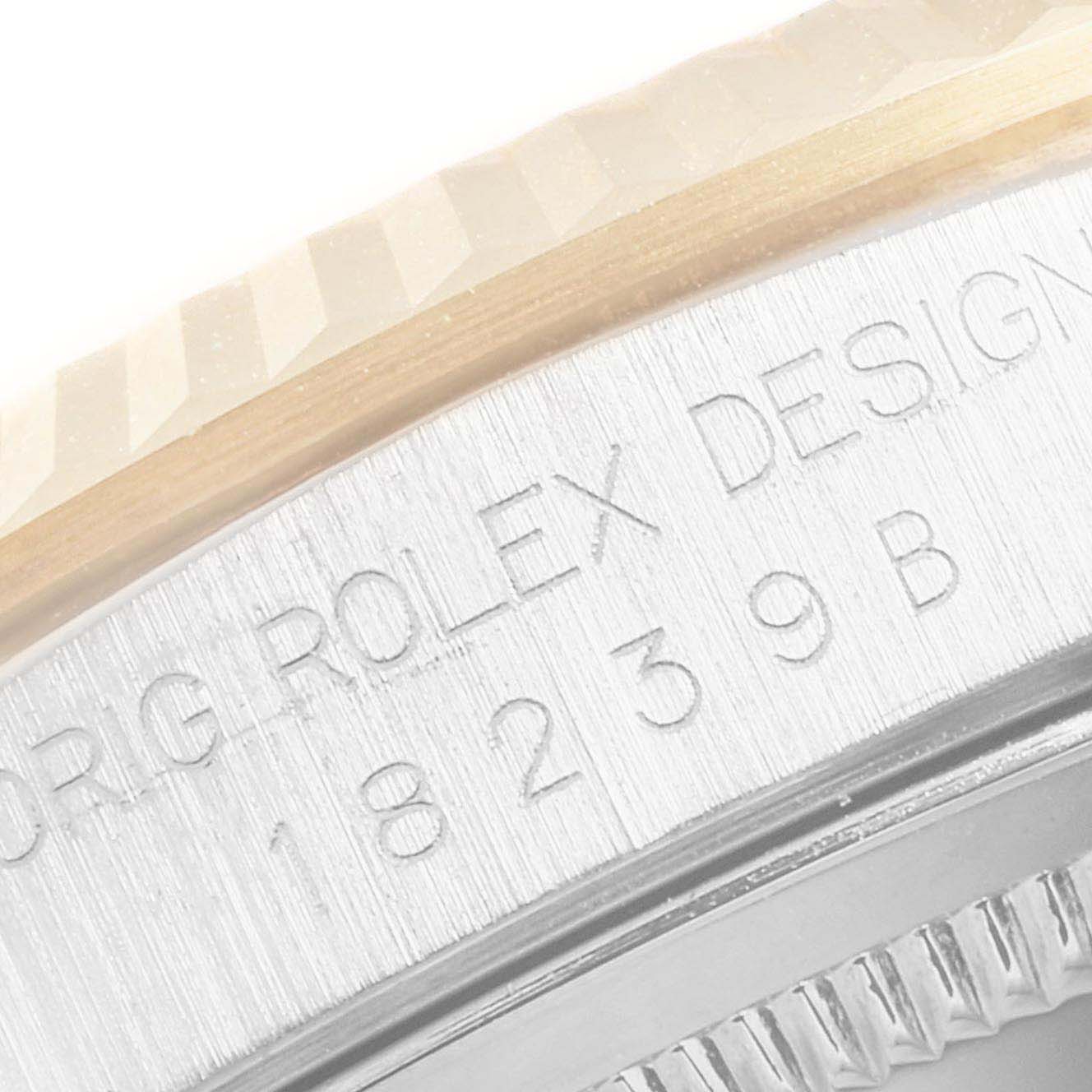 This image shows a close-up angle of the side of a Rolex President 18239 Men's White Gold Brown Dial 18239 Men's White Gold Brown Dial model watch, highlighting the engraved serial or model number and part of the bezel.
