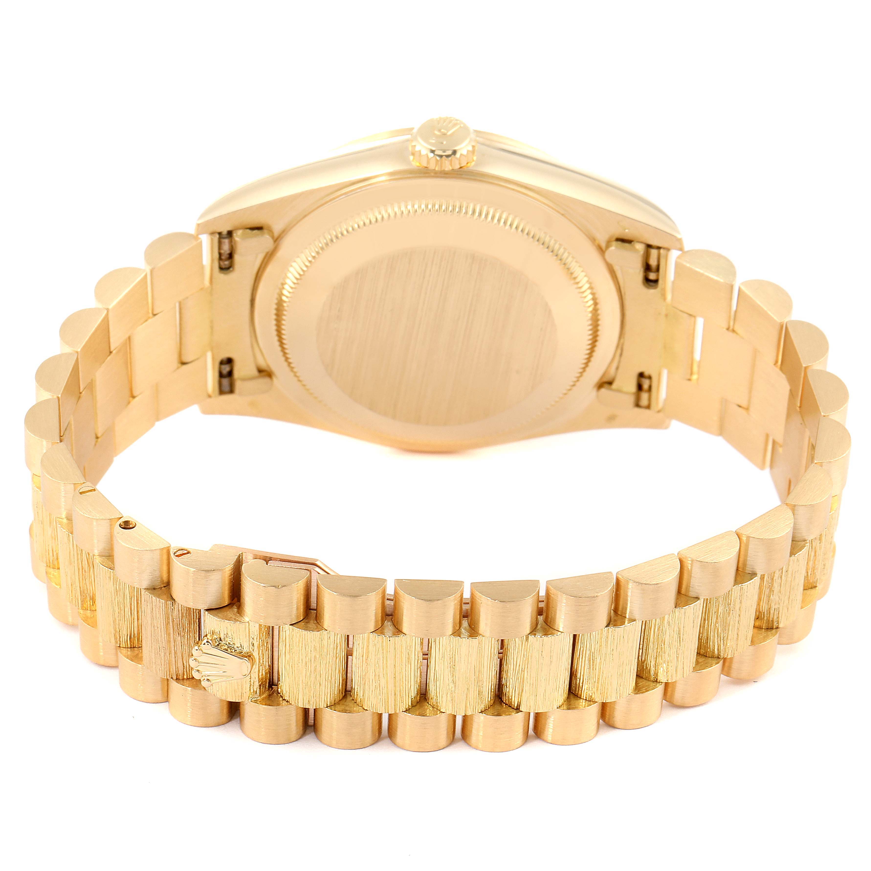 This image shows the back and bracelet of a Rolex President 18248 Men
s Yellow Gold Champagne Dial 18248 Men
s Yellow Gold Champagne Dial model watch from a rear angle.