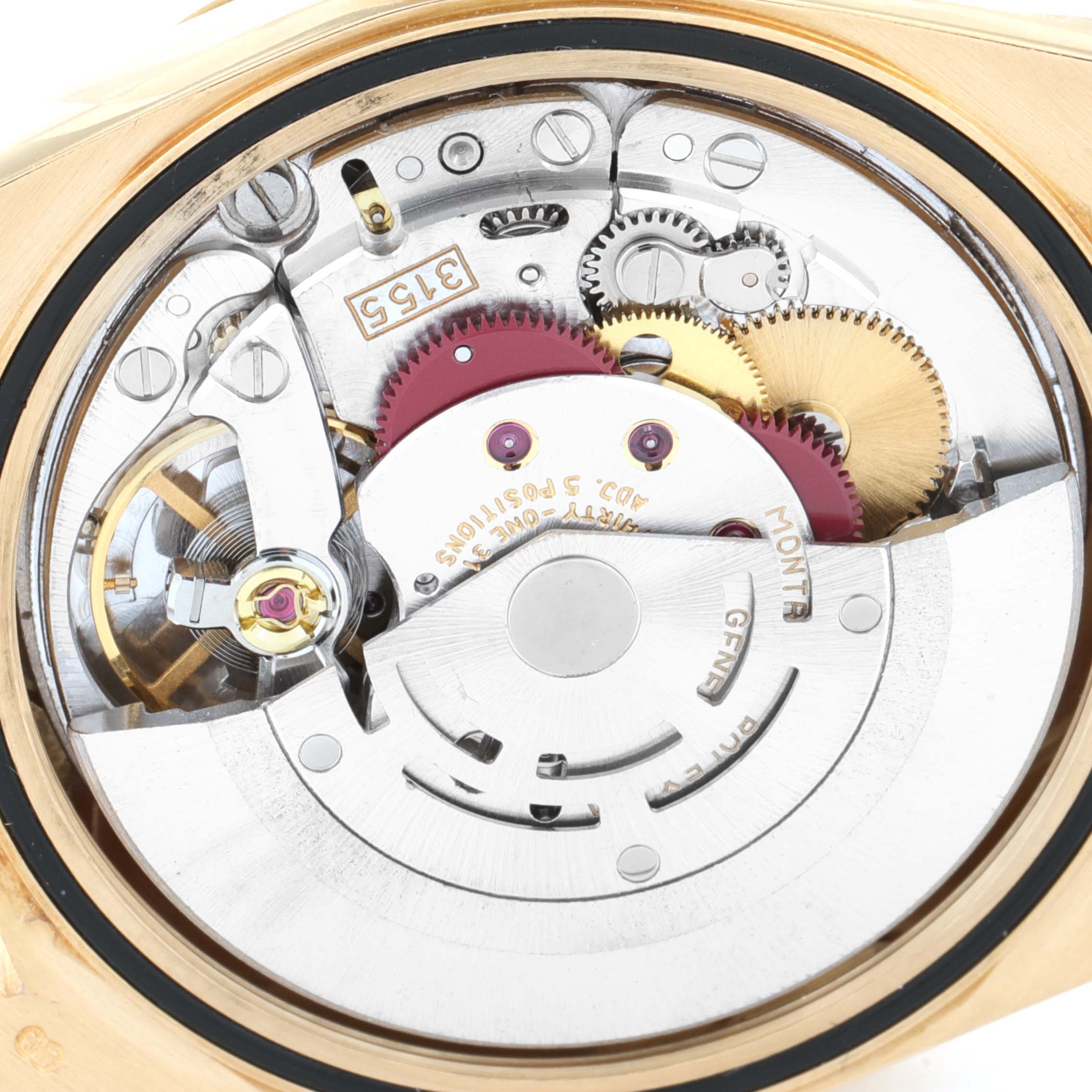 This image shows the inner movement mechanism of a Rolex President 18238 Men
s Yellow Gold Champagne Dial 18238 Men
s Yellow Gold Champagne Dial model watch from a close-up, rear angle.