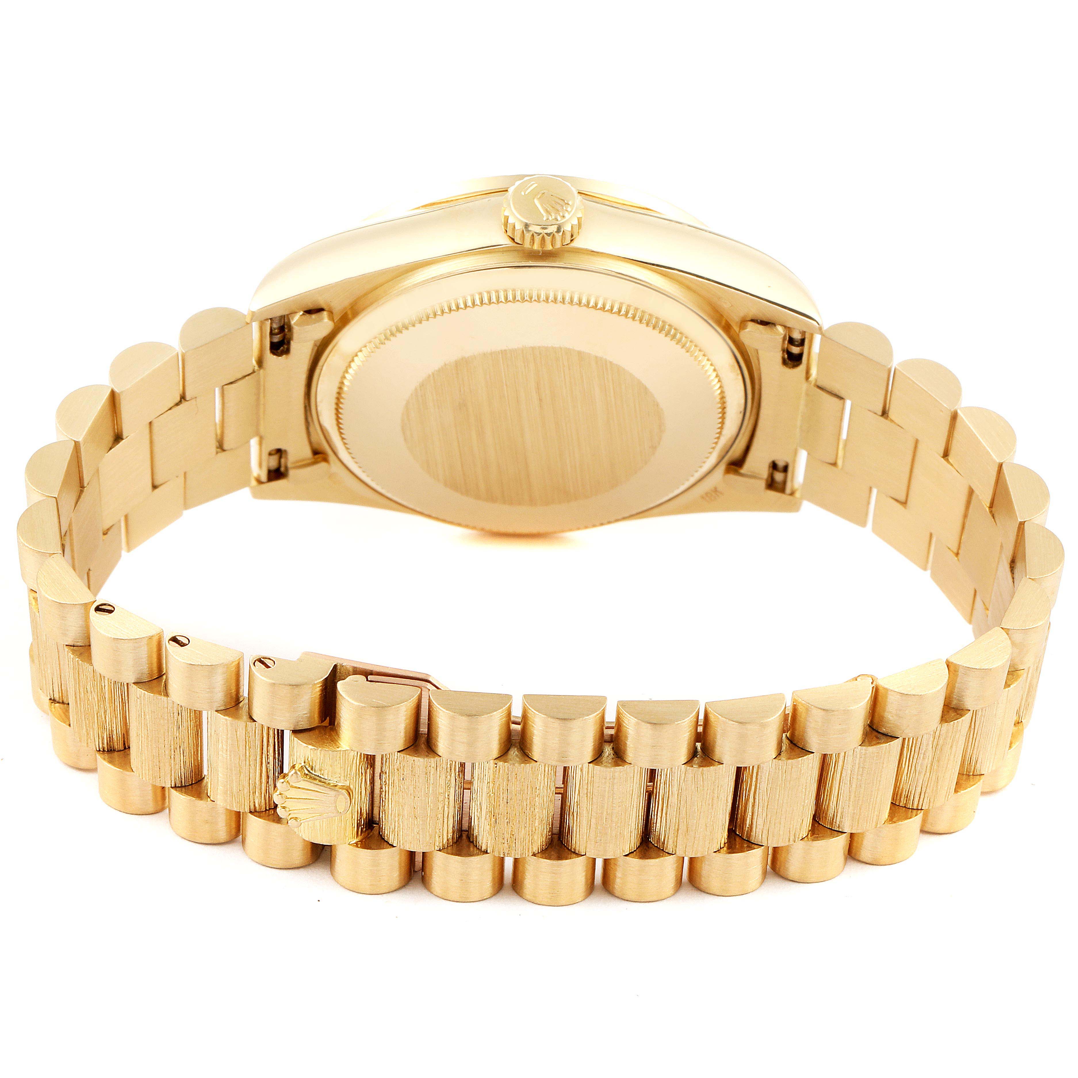 This image shows the back and bracelet of a Rolex President 18108 Men
s Yellow Gold Champagne Dial 18108 Men
s Yellow Gold Champagne Dial model watch.
