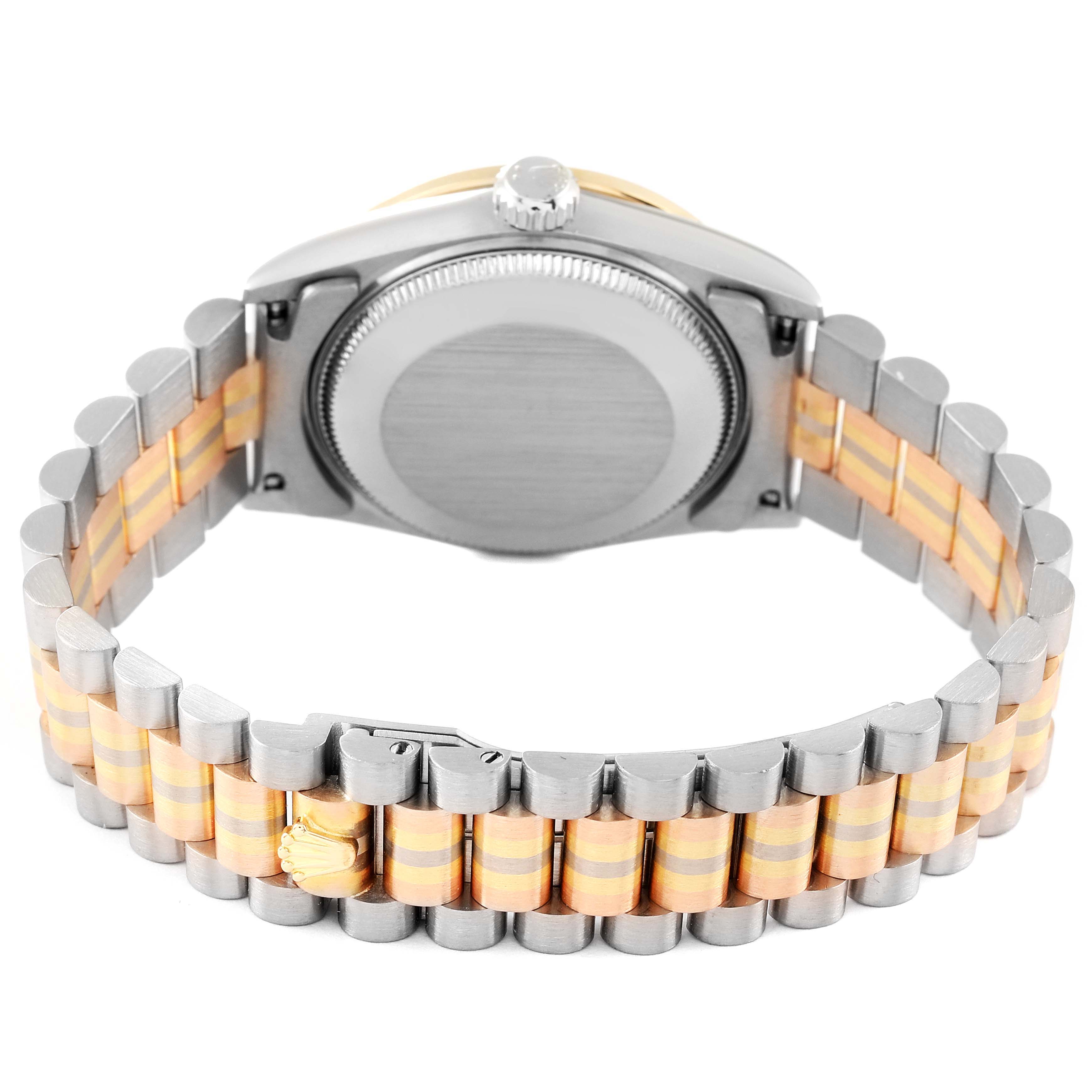 The image shows the back view of a mid-size Rolex watch including the case back and two-tone bracelet.