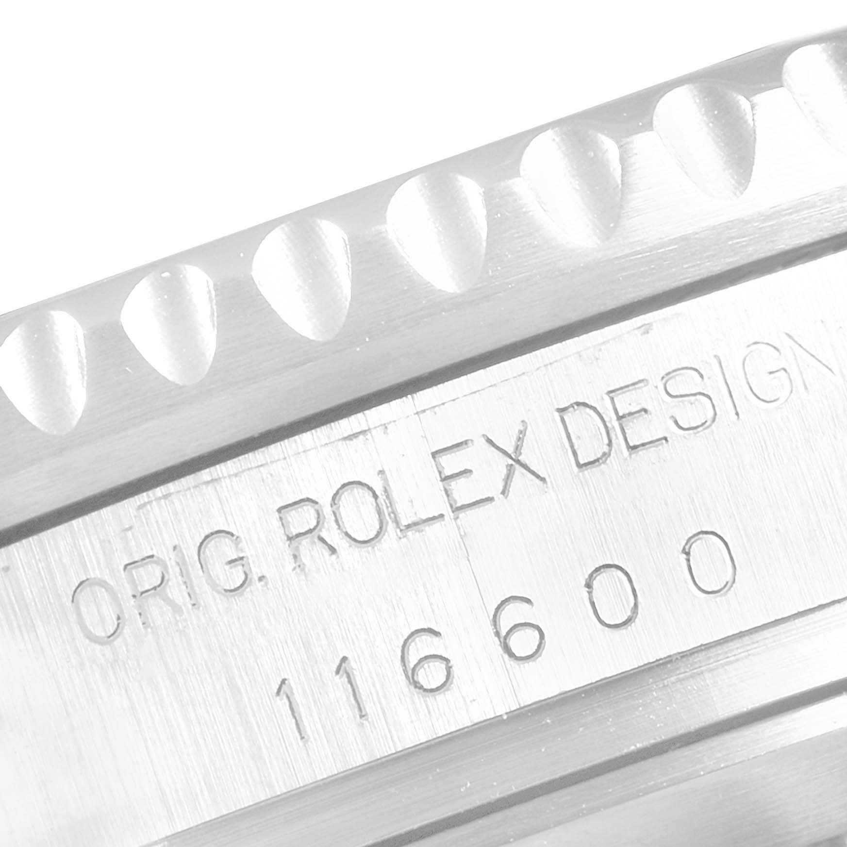 The image shows a close-up of the model number and bezel of a Rolex Sea-Dweller 116600 Men
s Stainless Steel Black Dial 116600 Men
s Stainless Steel Black Dial watch.