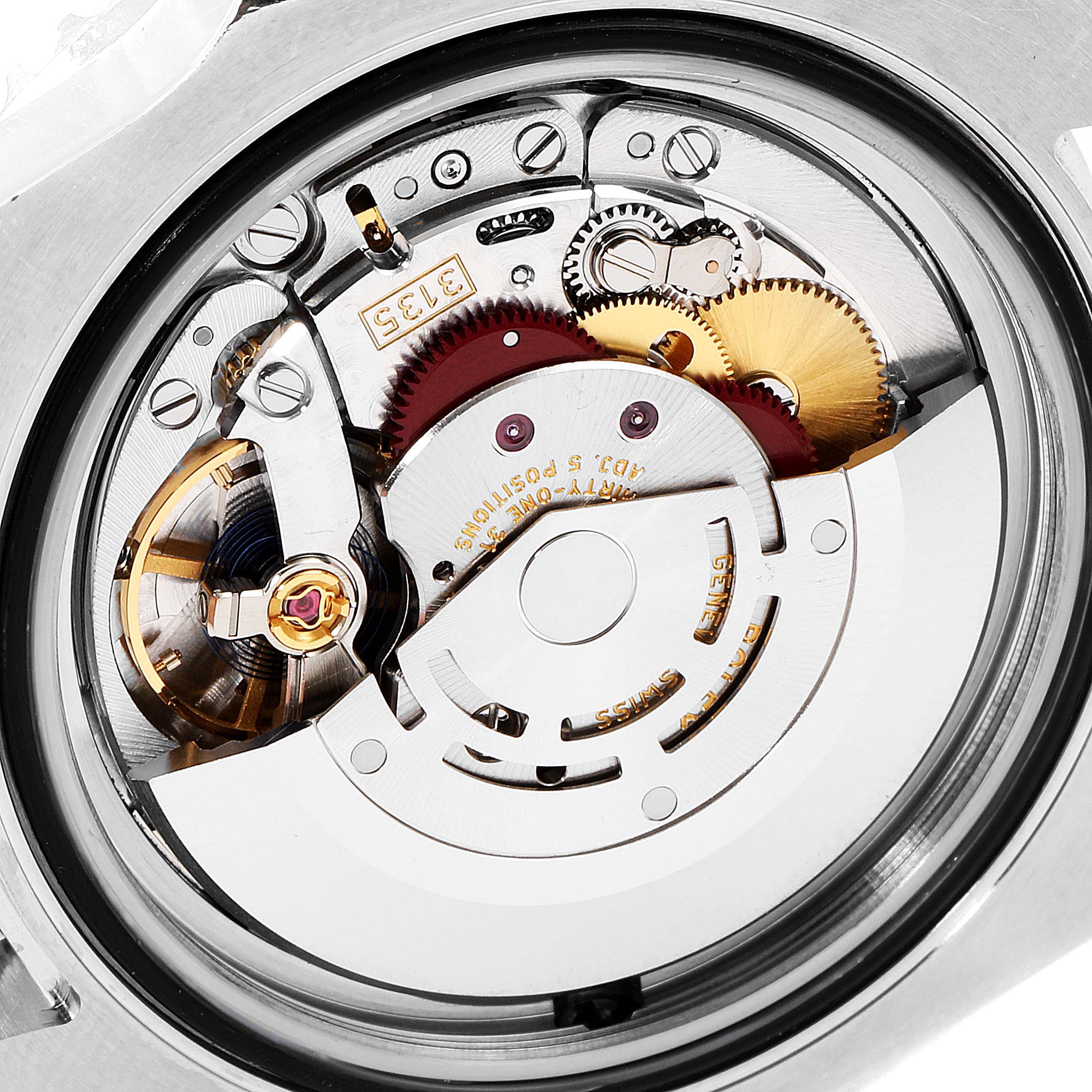 The image shows the inner mechanical movement of a Rolex Sea-Dweller 116600 Men
s Stainless Steel Black Dial 116600 Men
s Stainless Steel Black Dial watch from a close-up, top-down angle.