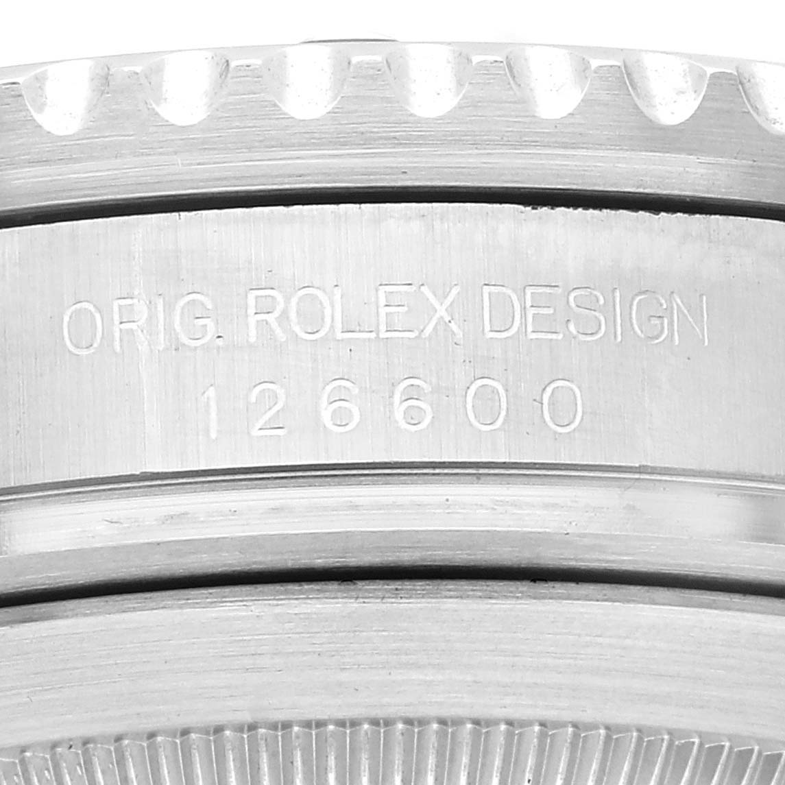 This image shows a close-up of the side case and bezel of a Rolex Sea-Dweller 126600 Men
s Stainless Steel Black Dial 126600 Men
s Stainless Steel Black Dial, highlighting the engraved design and model number 126600.