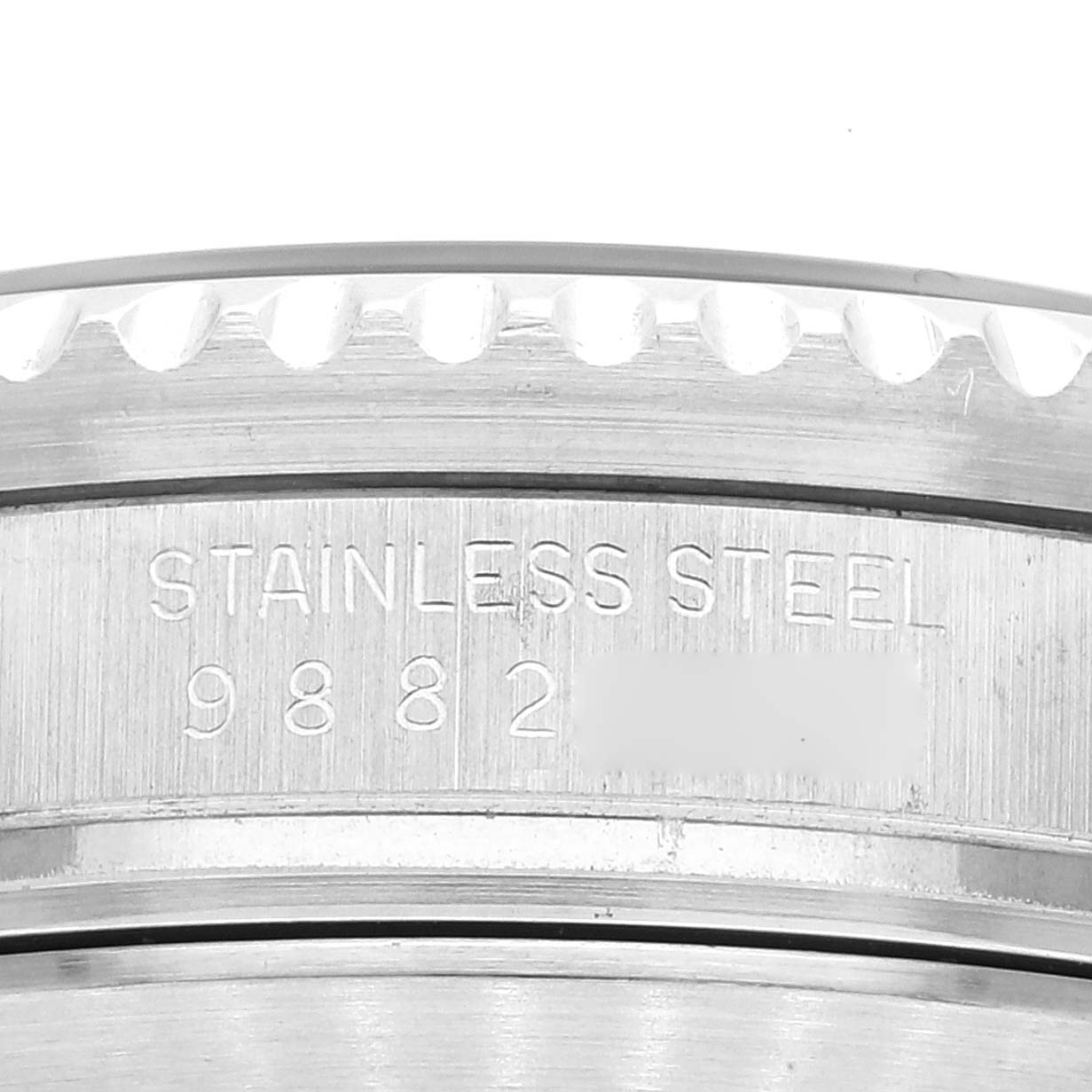 This image shows a close-up of the stainless steel case side with the serial number of the Rolex Vintage Collection 16660 Men's Stainless Steel Black Dial 16660 Men's Stainless Steel Black Dial watch.