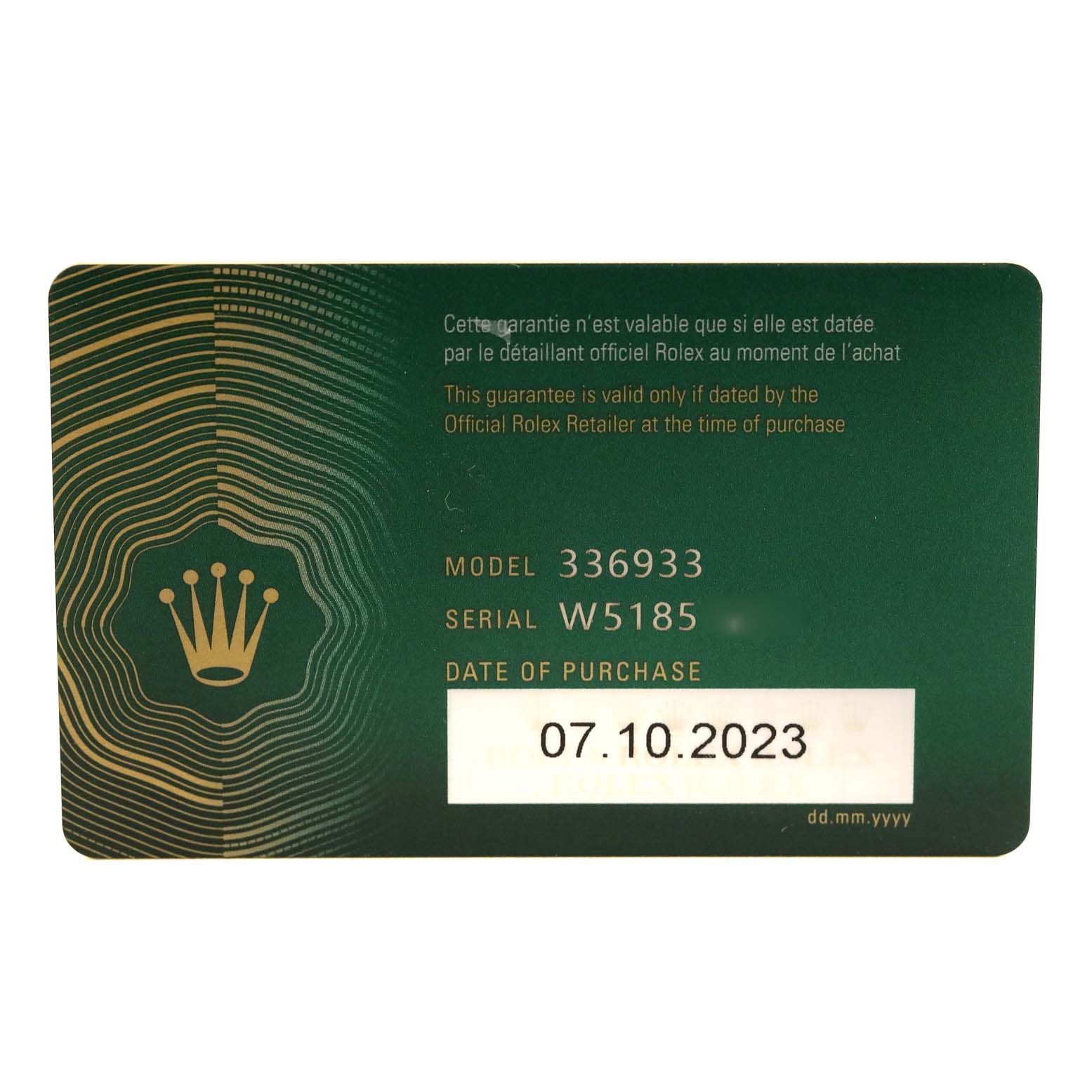 This image shows a warranty card for the Rolex Sky-Dweller 336933 Men
s Steel and Gold (two tone) Black Dial 336933 Men
s Steel and Gold (two tone) Black Dial model, displaying its model number, serial number, and date of purchase.