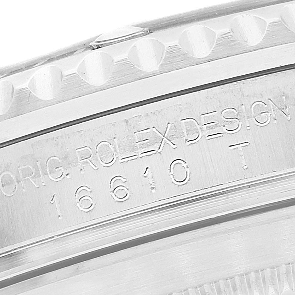 This image shows a close-up of the case side of a Rolex Submariner 16610 Men
s Stainless Steel Black Dial 16610 Men
s Stainless Steel Black Dial, displaying the model number "16610" and part of its bezel.
