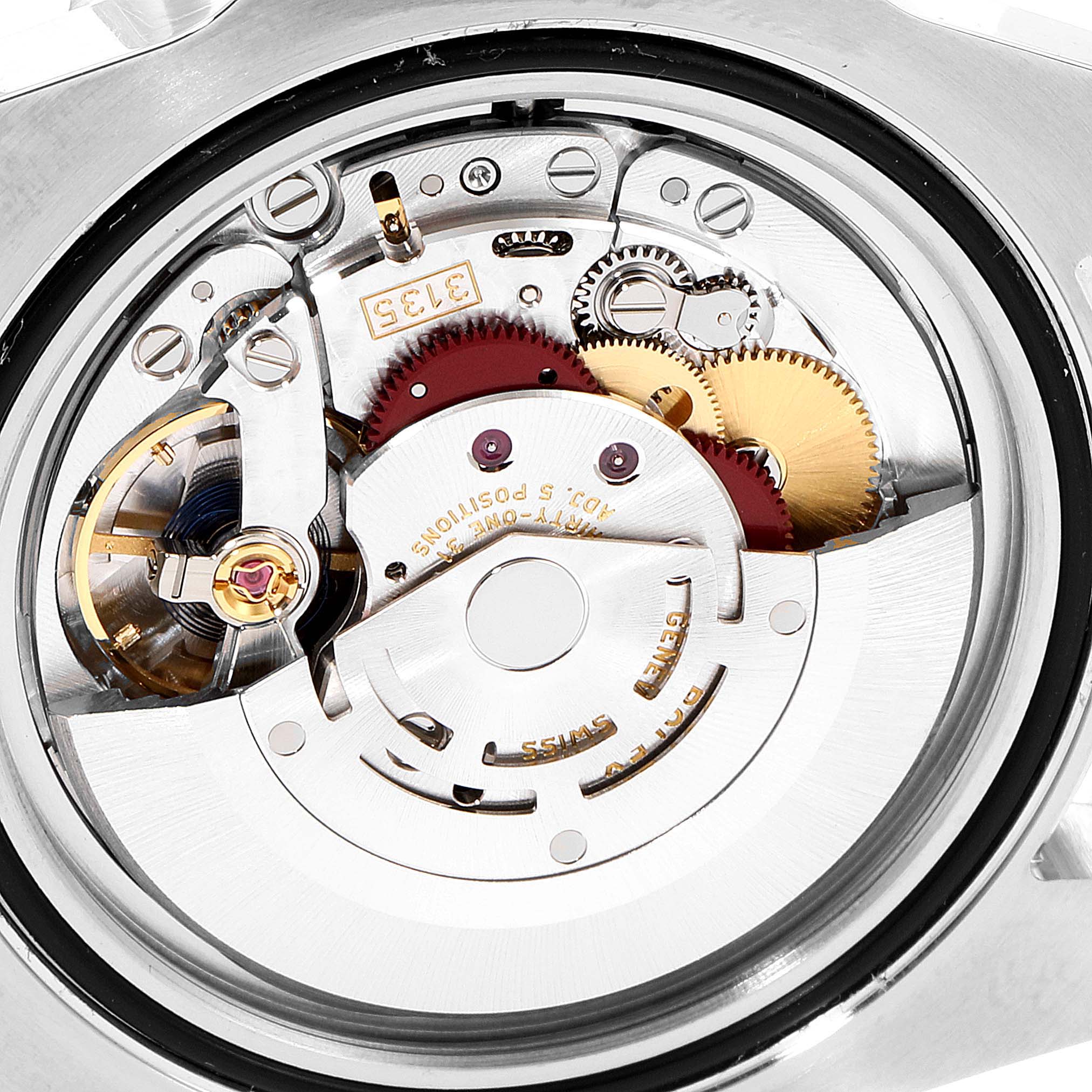 The image shows the open case back view of a Rolex Submariner 116610 Men
s Stainless Steel Black Dial 116610 Men
s Stainless Steel Black Dial
s internal mechanism, revealing gears and other moving parts.