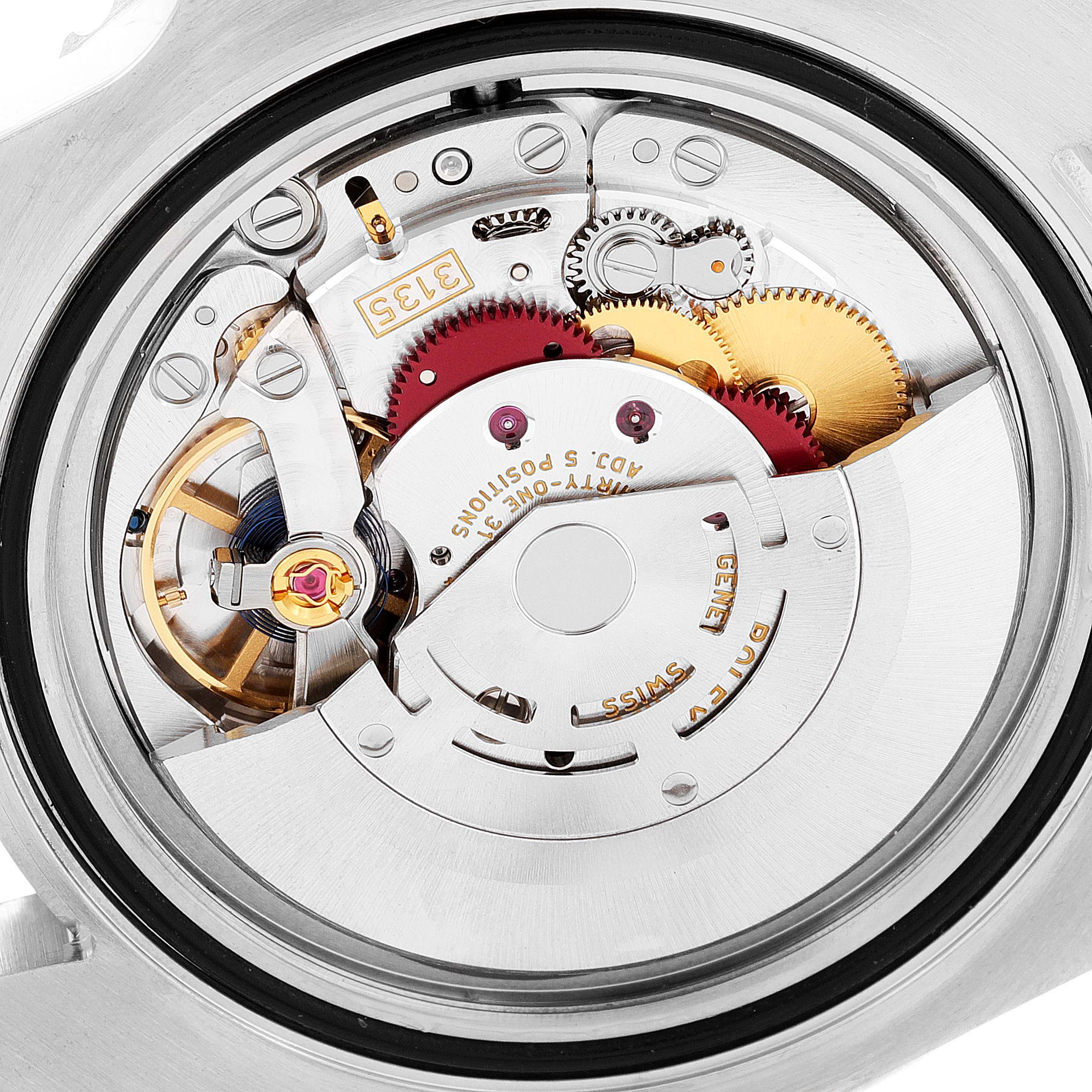 The image shows the back view of a Rolex Submariner 116610LV Men
s Stainless Steel Green Dial 116610LV Men
s Stainless Steel Green Dial, highlighting its intricate movement and internal components.