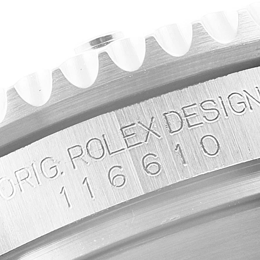 The image shows a close-up of the bezel and engraving on the Rolex Submariner 116610LV Men
s Stainless Steel Green Dial 116610LV Men
s Stainless Steel Green Dial model 116610.