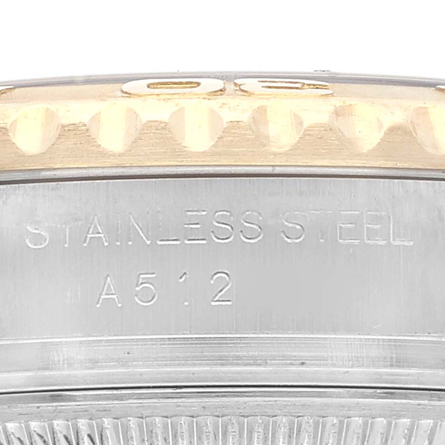 The image shows a close-up of the Rolex Yacht-Master 169623 Women's Steel and Gold (two tone) Blue Dial 169623 Women's Steel and Gold (two tone) Blue Dial's bezel and case, highlighting the stainless steel and model inscription.