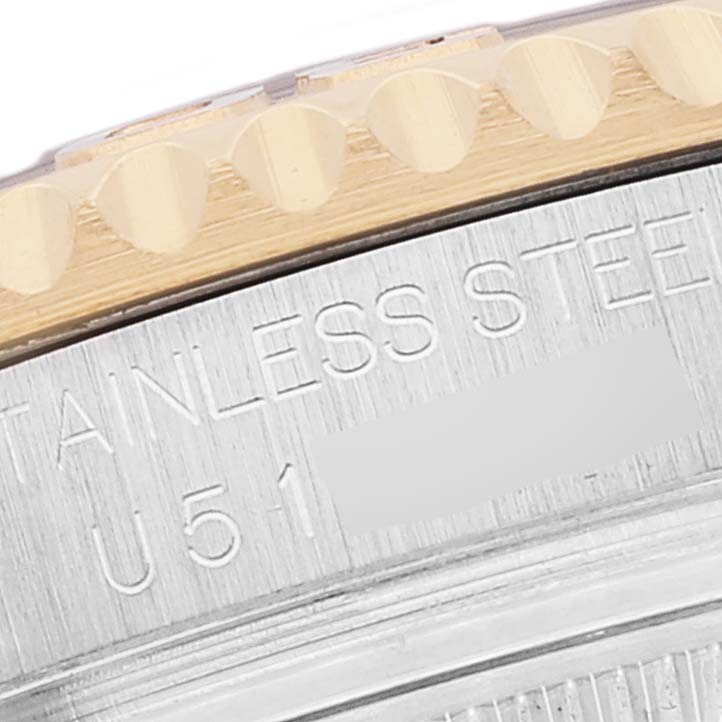 The image shows a close-up of the case back and bezel of the Rolex Yacht-Master 68623 Men
s Steel and Gold (two tone) Blue Dial 68623 Men
s Steel and Gold (two tone) Blue Dial watch.