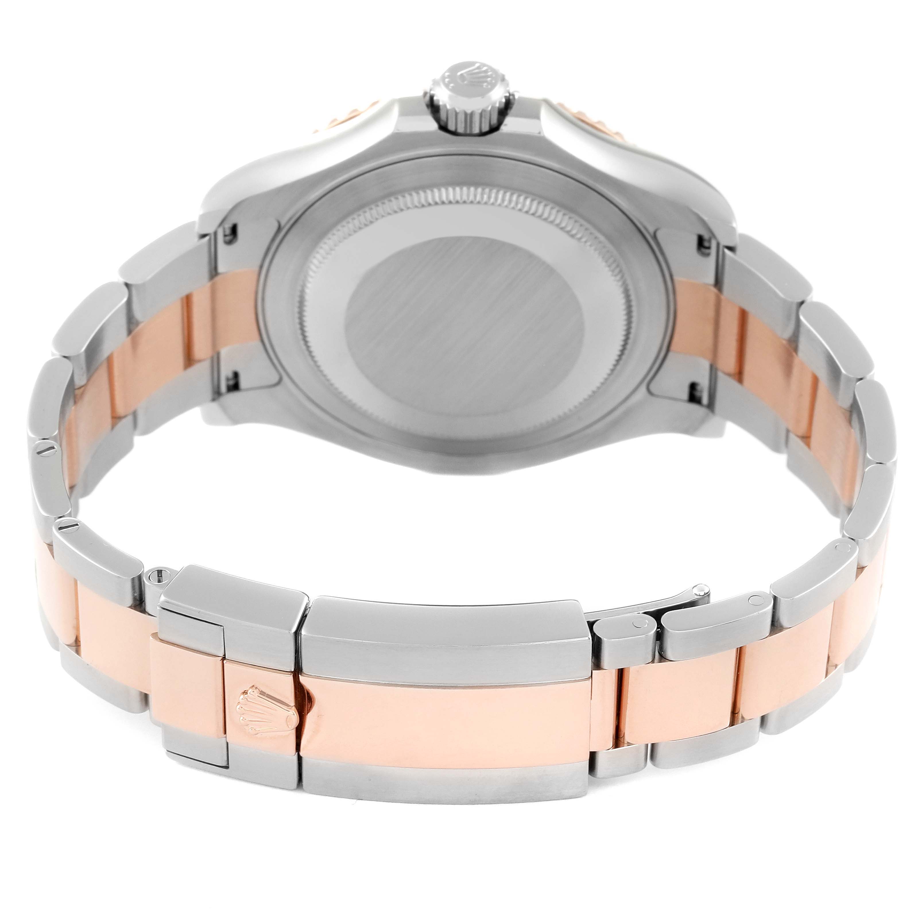 This image shows the back of a Rolex Yacht-Master 116621 Men's Steel and Gold (two tone) Brown Dial 116621 Men's Steel and Gold (two tone) Brown Dial watch, featuring the case back, crown, and two-tone bracelet.