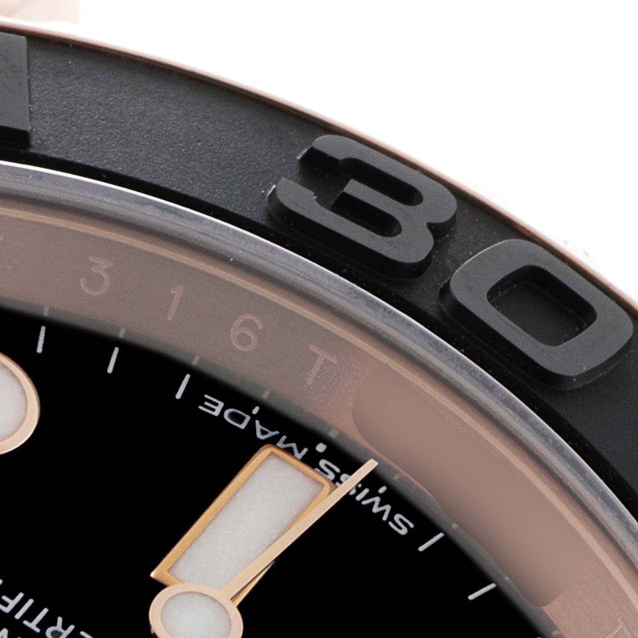 This close-up shows the bezel, part of the dial, and "Swiss Made" text on a Rolex Yacht-Master 116655 Men
s Rose Gold Black Dial 116655 Men
s Rose Gold Black Dial watch.