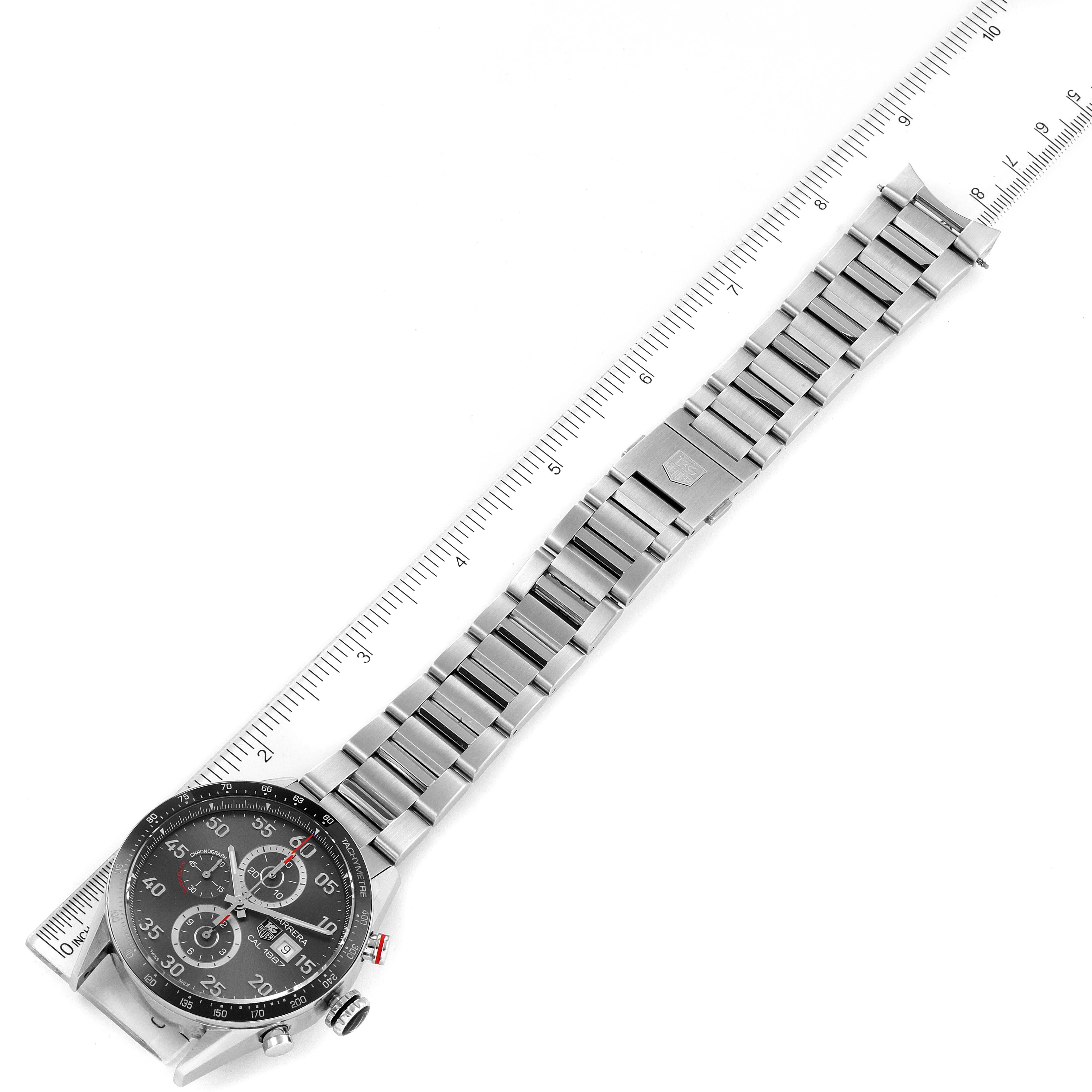 The Tag Heuer Carrera CAR2A11.BA0799 Men's Stainless Steel Grey Dial CAR2A11.BA0799 Men's Stainless Steel Grey Dial watch is photographed from above, showing its face, bezel, and entire metal bracelet.