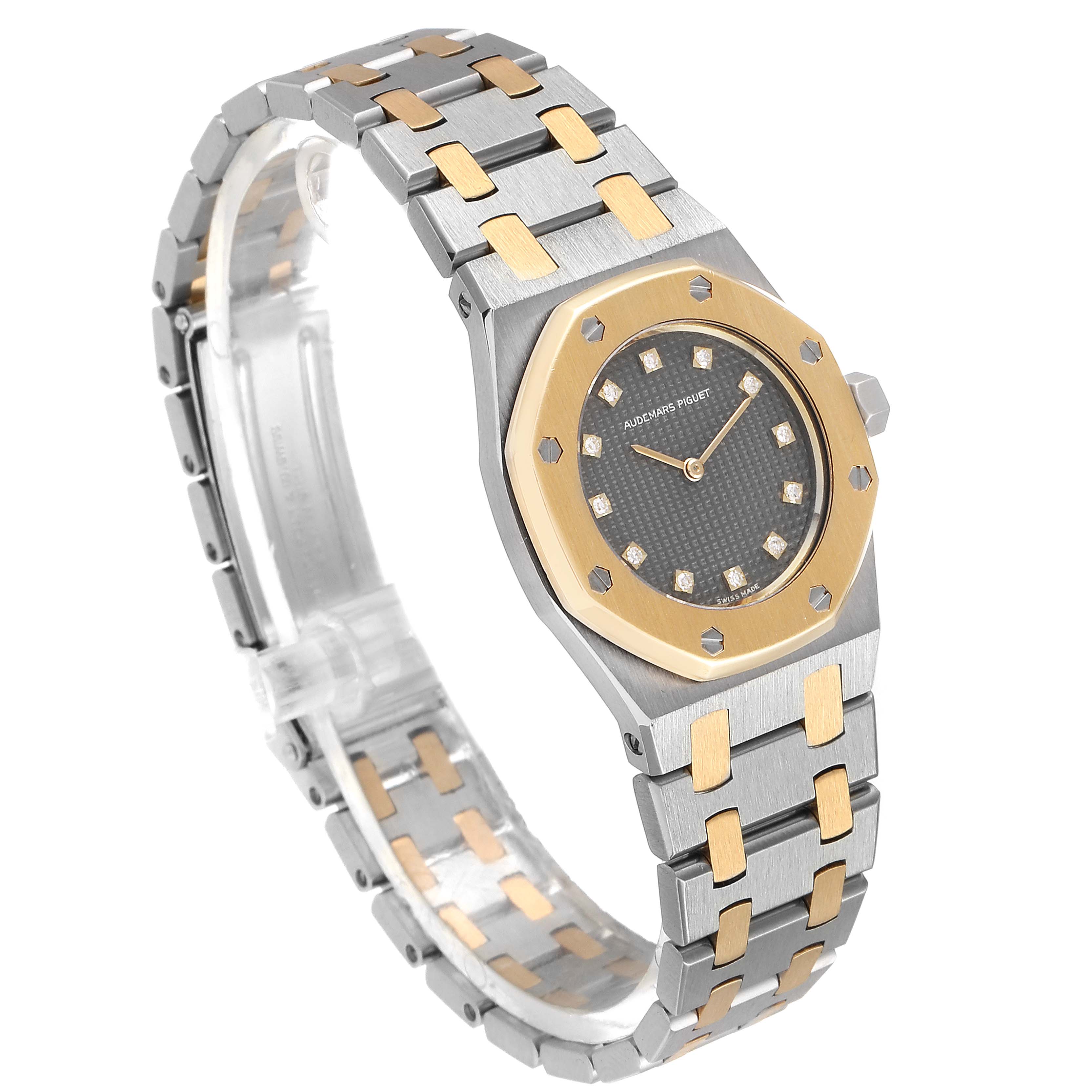 This image shows the Audemars Piguet Royal Oak 6131-516 Women's Steel and Gold (two tone) Grey Dial 6131-516 Women's Steel and Gold (two tone) Grey Dial watch in a three-quarter angle, highlighting its case, bezel, and bracelet.
