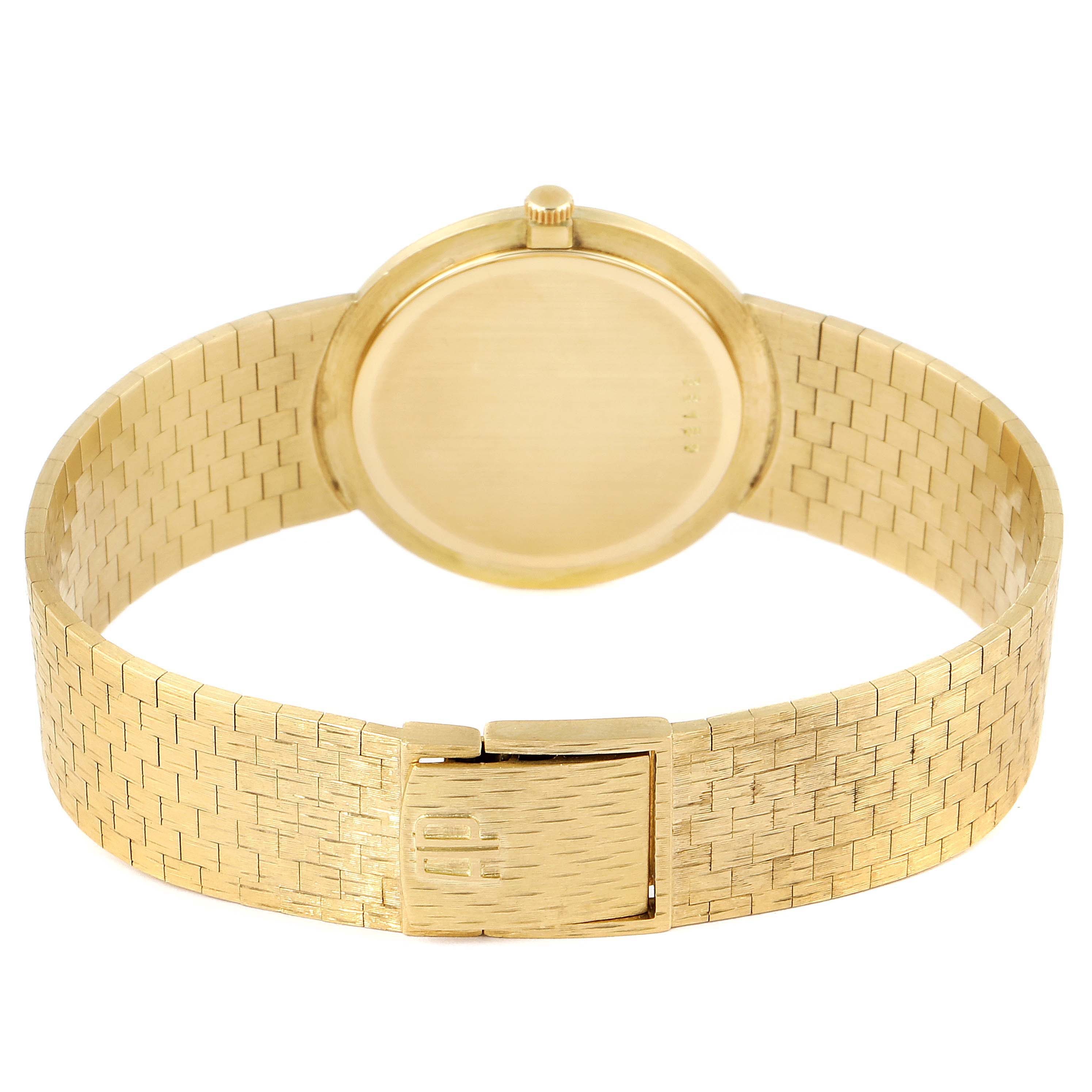 The image shows the back of the Audemars Piguet Vintage  Men's Yellow Gold Champagne Dial  Men's Yellow Gold Champagne Dial watch, including the clasp and bracelet.