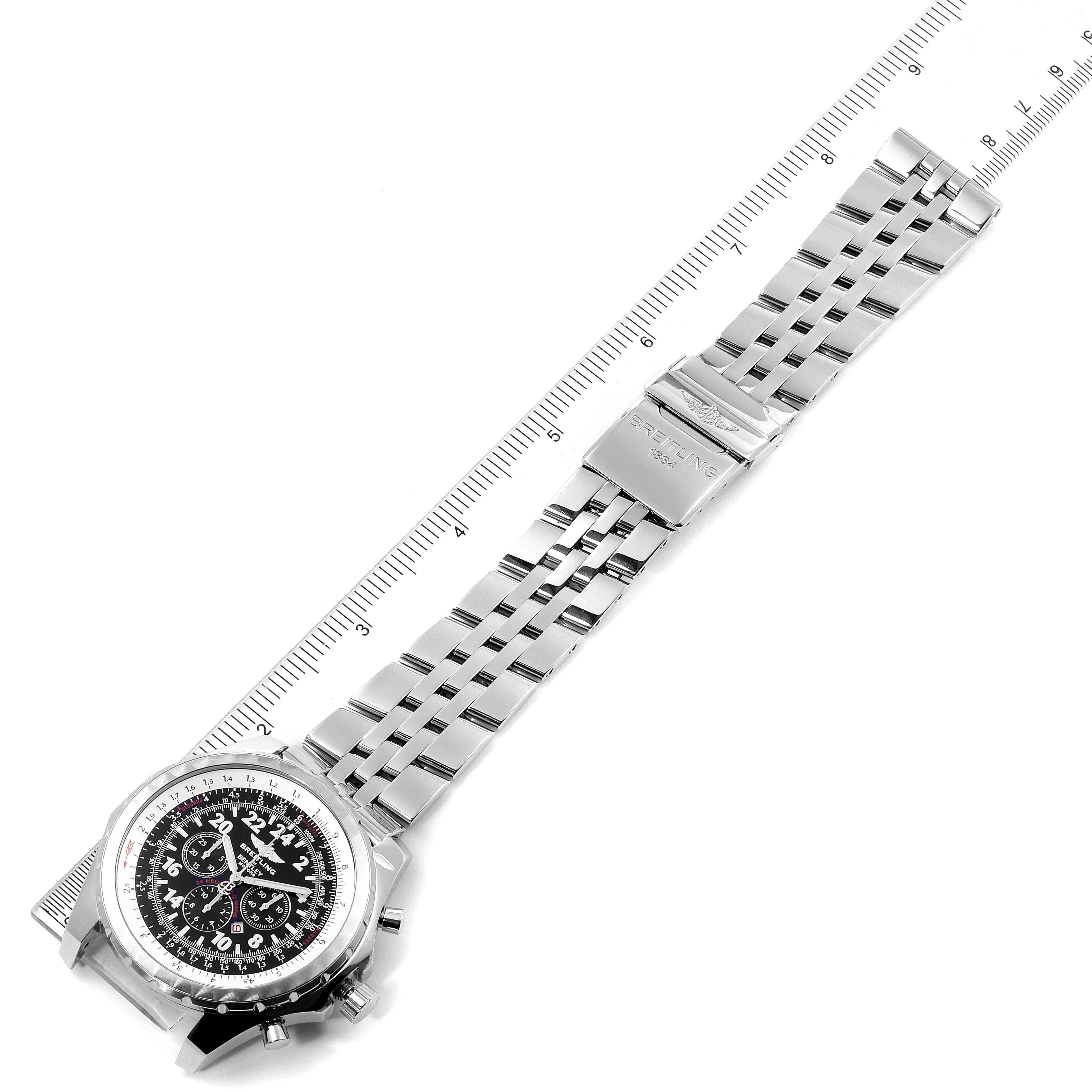 The image shows the Bentley model watch by Breitling from a top-down angle, displaying its face, band, and clasp.