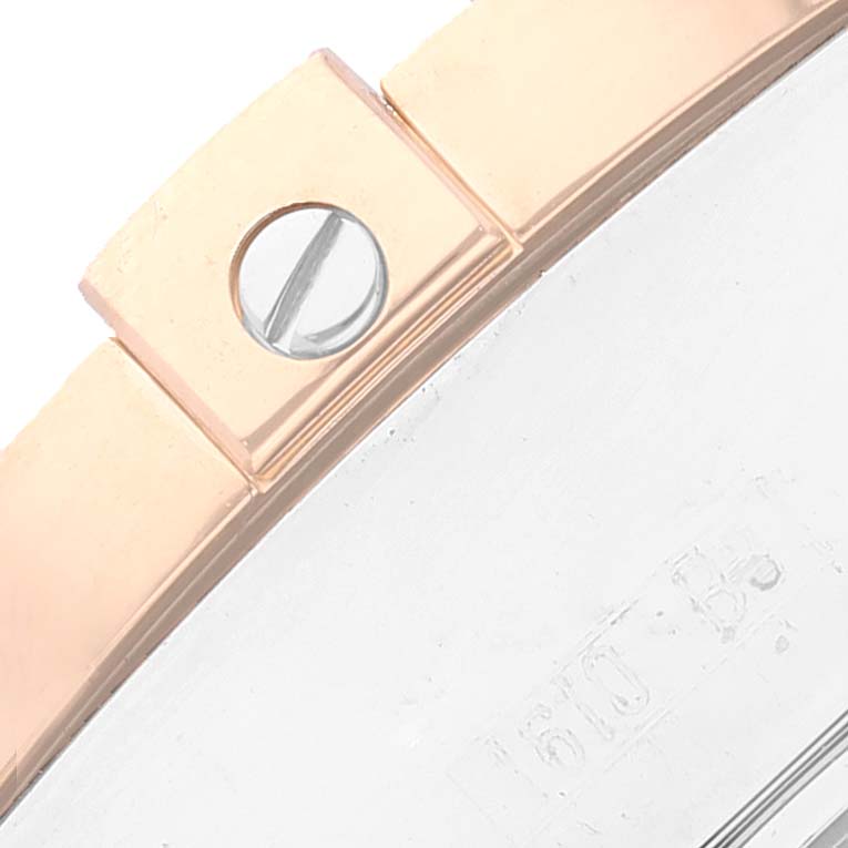 This close-up angle shows the edge of the bezel and a screw of the Breitling Galactic C13358L2/A686/366C Men's Steel and Gold (two tone) Mother of Pearl Dial C13358L2/A686/366C Men's Steel and Gold (two tone) Mother of Pearl Dial watch.