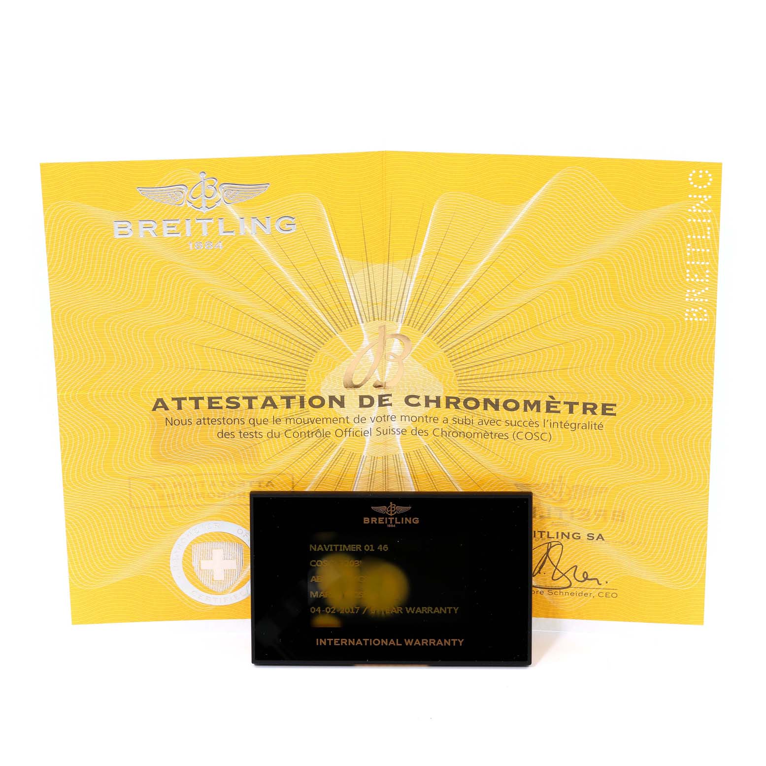 This image shows the Breitling Navitimer AB012721-C889-453A Men's Stainless Steel Blue Dial AB012721-C889-453A Men's Stainless Steel Blue Dial model's warranty card and chronometer certificate.