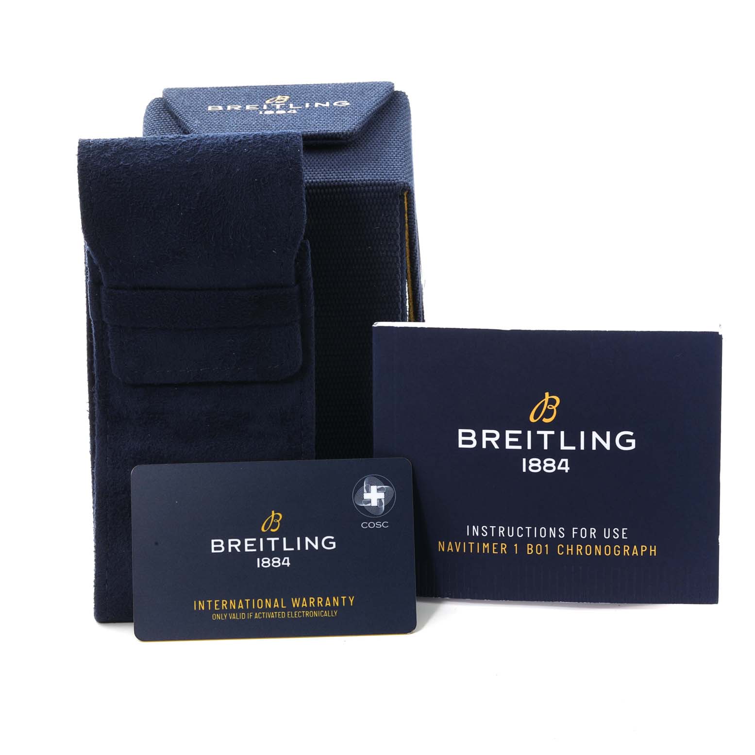 This image shows the packaging, warranty card, and instruction booklet for the Breitling Navitimer AB0127 Men's Stainless Steel Black Dial AB0127 Men's Stainless Steel Black Dial model.