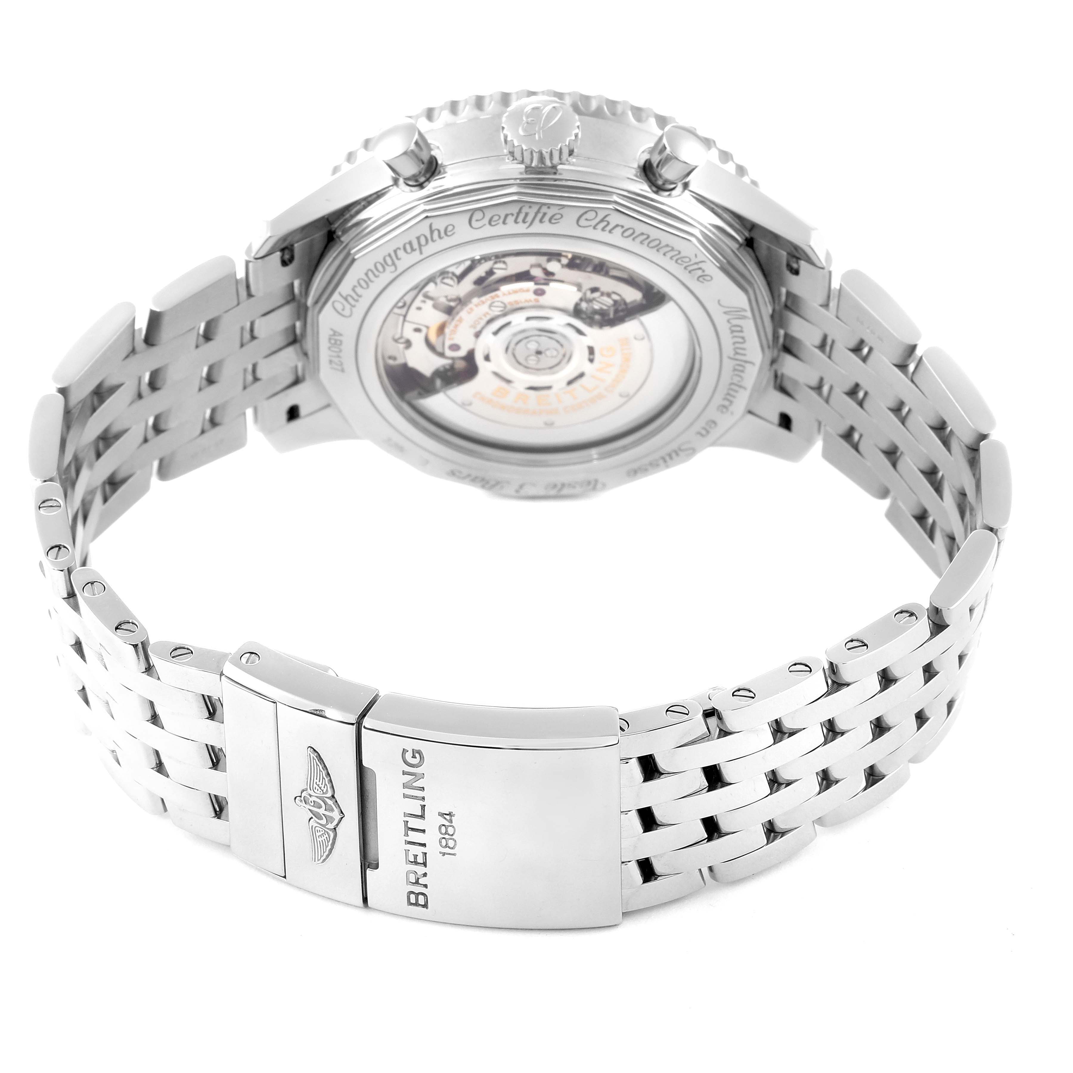 The image shows the back view of a Breitling Navitimer AB0127 Men's Stainless Steel Black Dial AB0127 Men's Stainless Steel Black Dial watch, highlighting the movement, crown, and bracelet clasp.