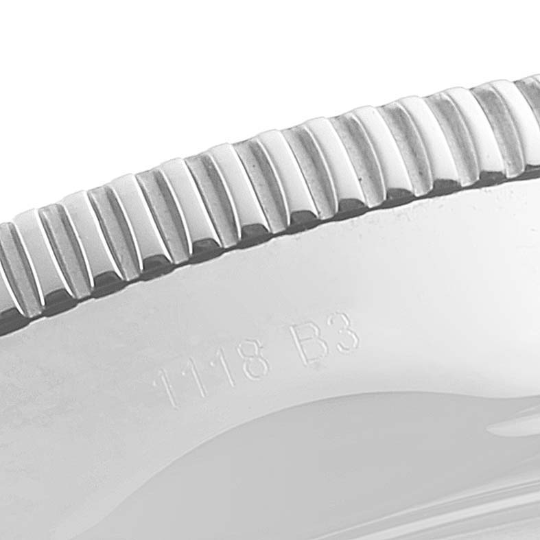 This image shows a close-up of the bezel and part of the case of a Breitling Superocean AB2010161C1A1 Men's Stainless Steel Black Dial AB2010161C1A1 Men's Stainless Steel Black Dial watch.