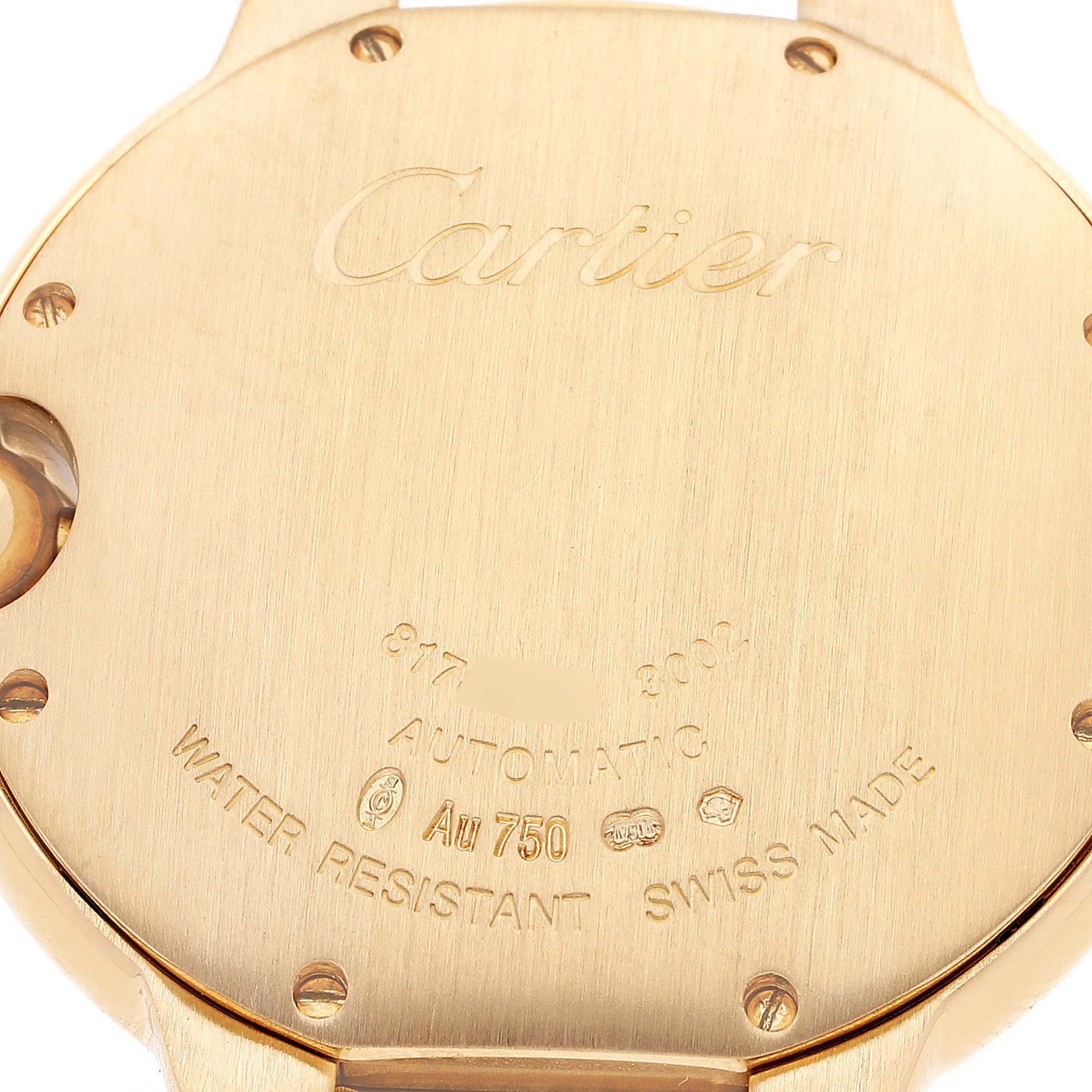 This image shows the back case of a Cartier Ballon Bleu WE900451 Men's Yellow Gold Silver Dial WE900451 Men's Yellow Gold Silver Dial watch with detailed engravings and hallmark stamps.