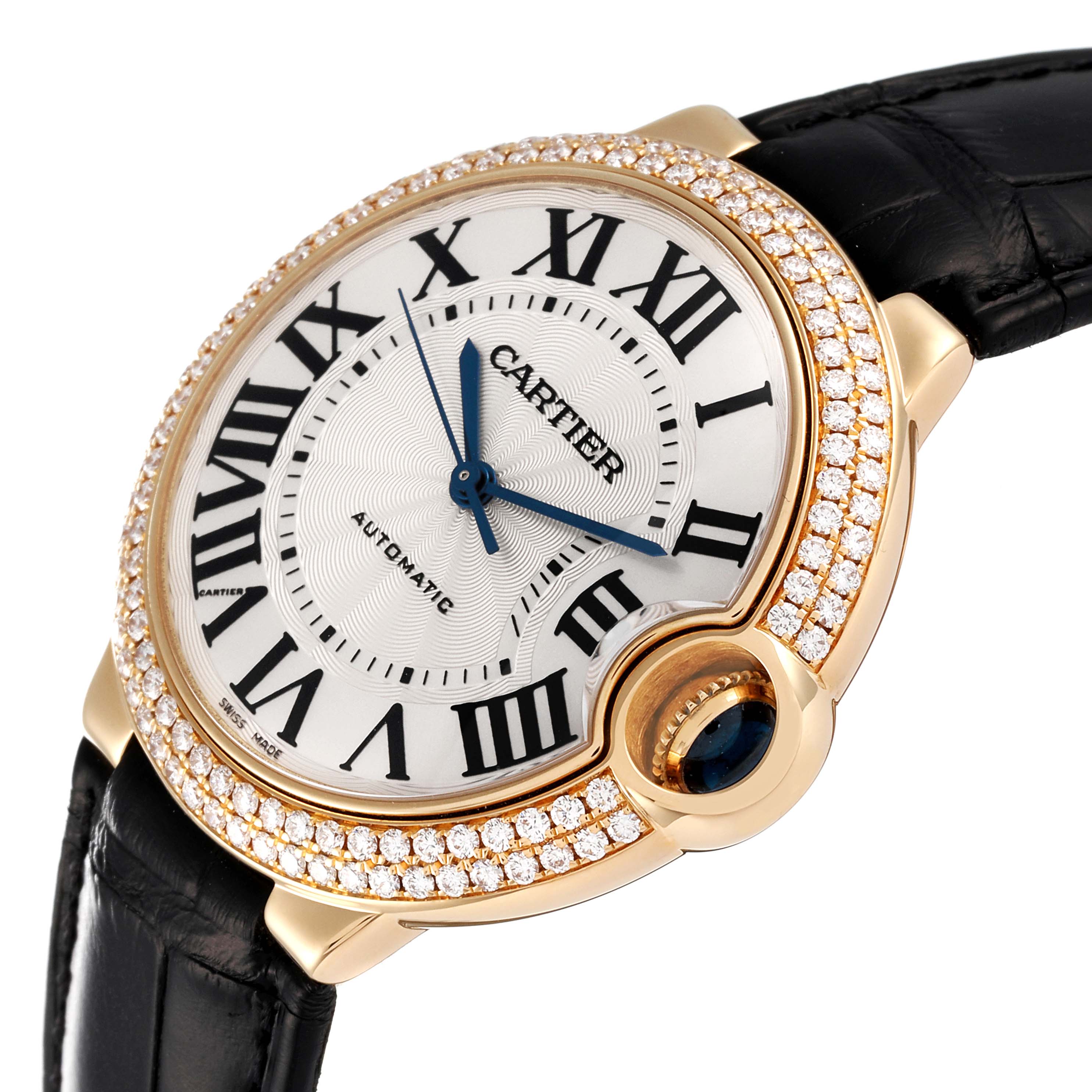 The image shows a close-up angle of the Cartier Ballon Bleu WE900451 Men's Yellow Gold Silver Dial WE900451 Men's Yellow Gold Silver Dial watch, highlighting the diamond-studded bezel, dial, and crown.