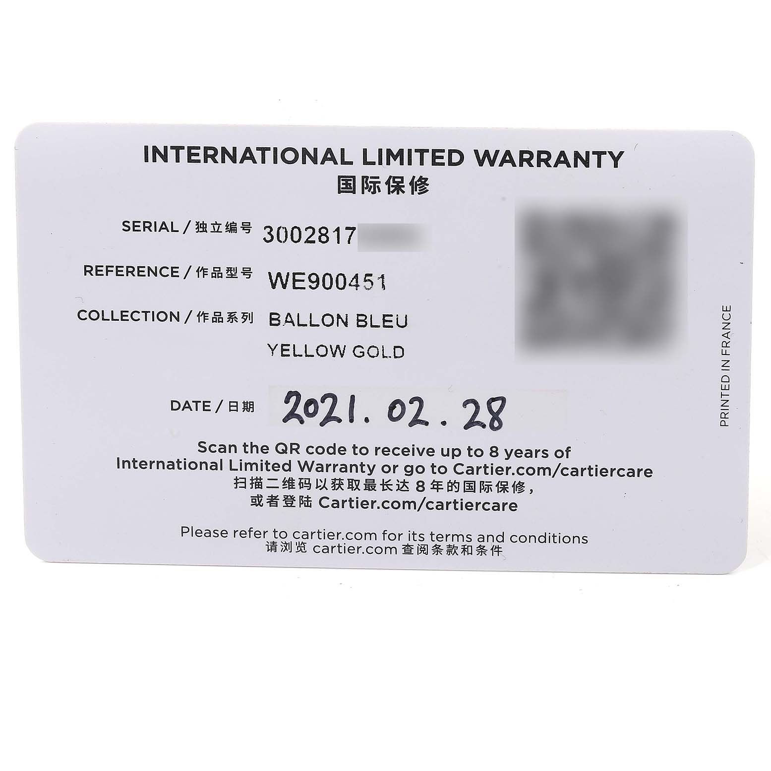 The image shows an International Limited Warranty card for a Cartier Ballon Bleu WE900451 Men's Yellow Gold Silver Dial WE900451 Men's Yellow Gold Silver Dial watch, indicating its serial and reference numbers.