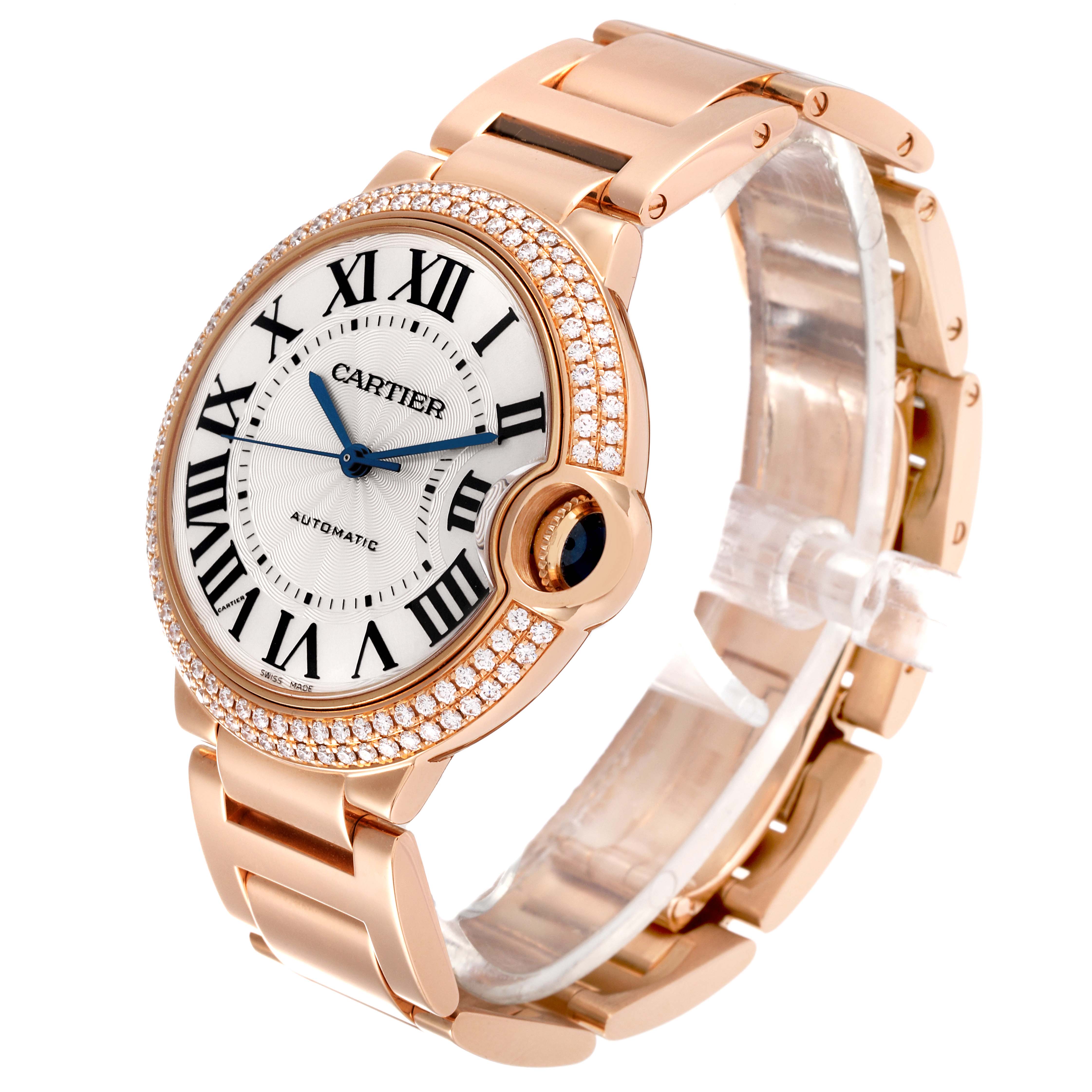 This image shows a Ballon Bleu de Cartier watch from a front angle, highlighting its round face, Roman numerals, and metal bracelet.