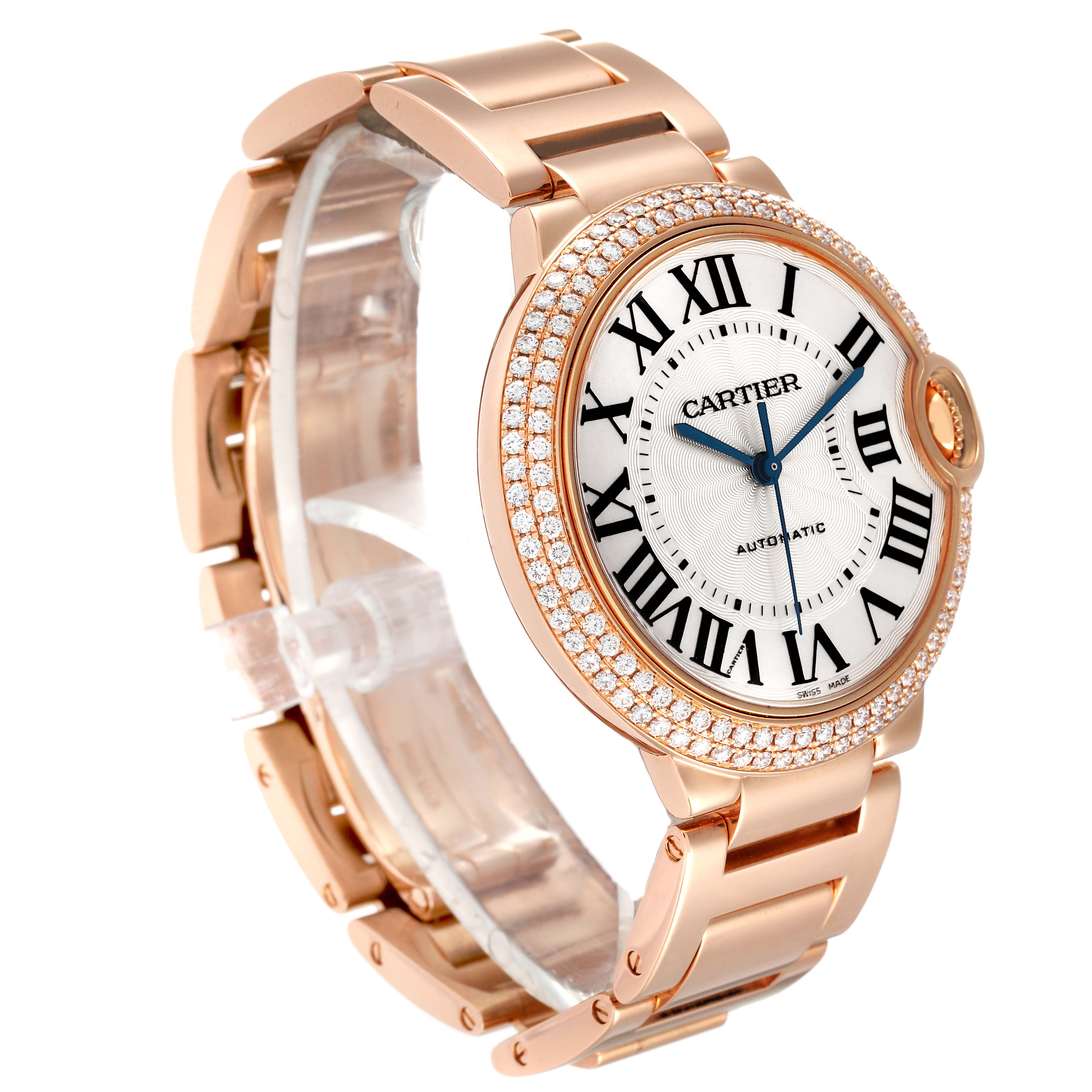 The image shows a Ballon Bleu de Cartier watch at a slight angle, displaying its bracelet, dial, and diamond-encrusted bezel.