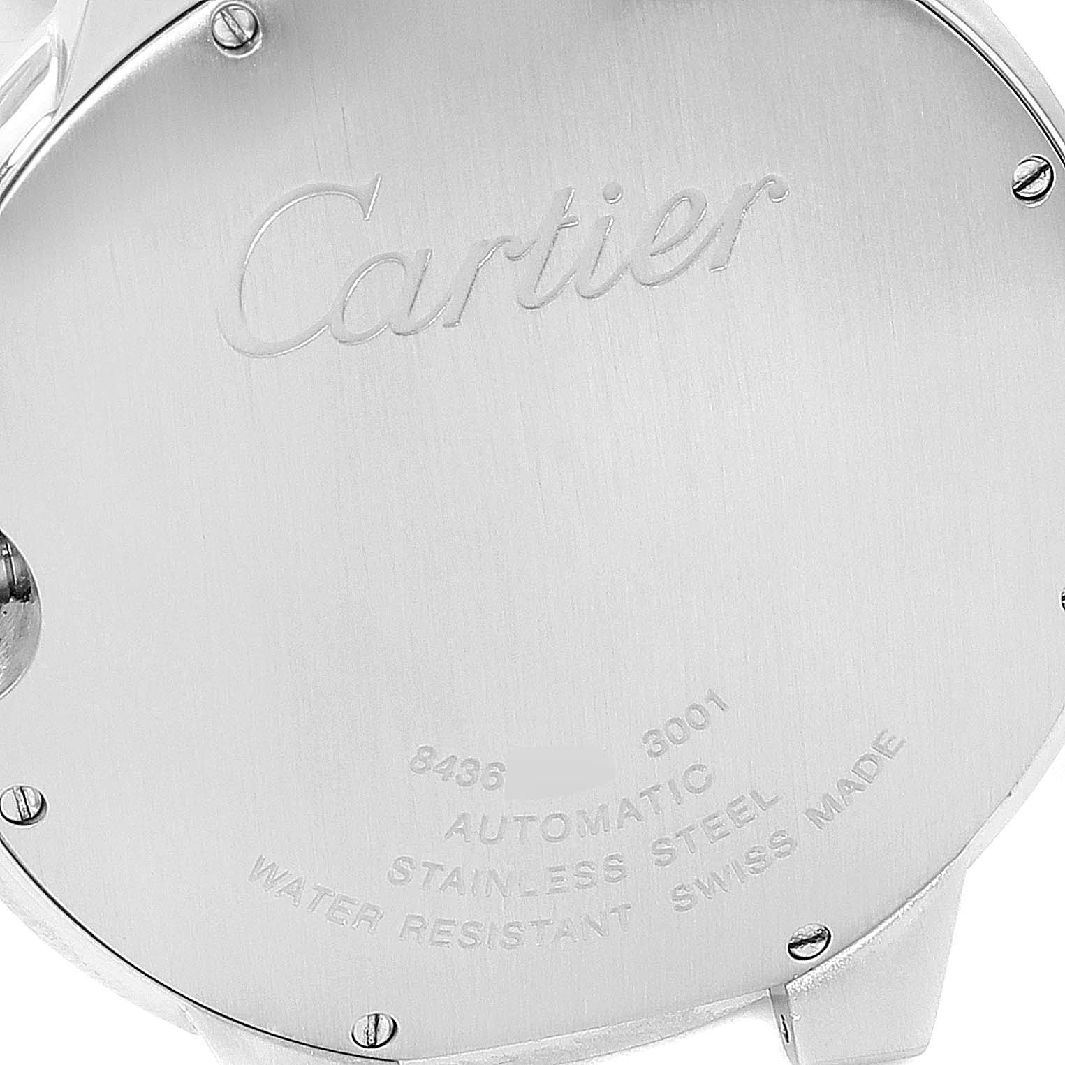 This image shows the back case of a Cartier Ballon Bleu W69012Z4 Men's Stainless Steel Silver Dial W69012Z4 Men's Stainless Steel Silver Dial watch, highlighting the engraved text and screws.
