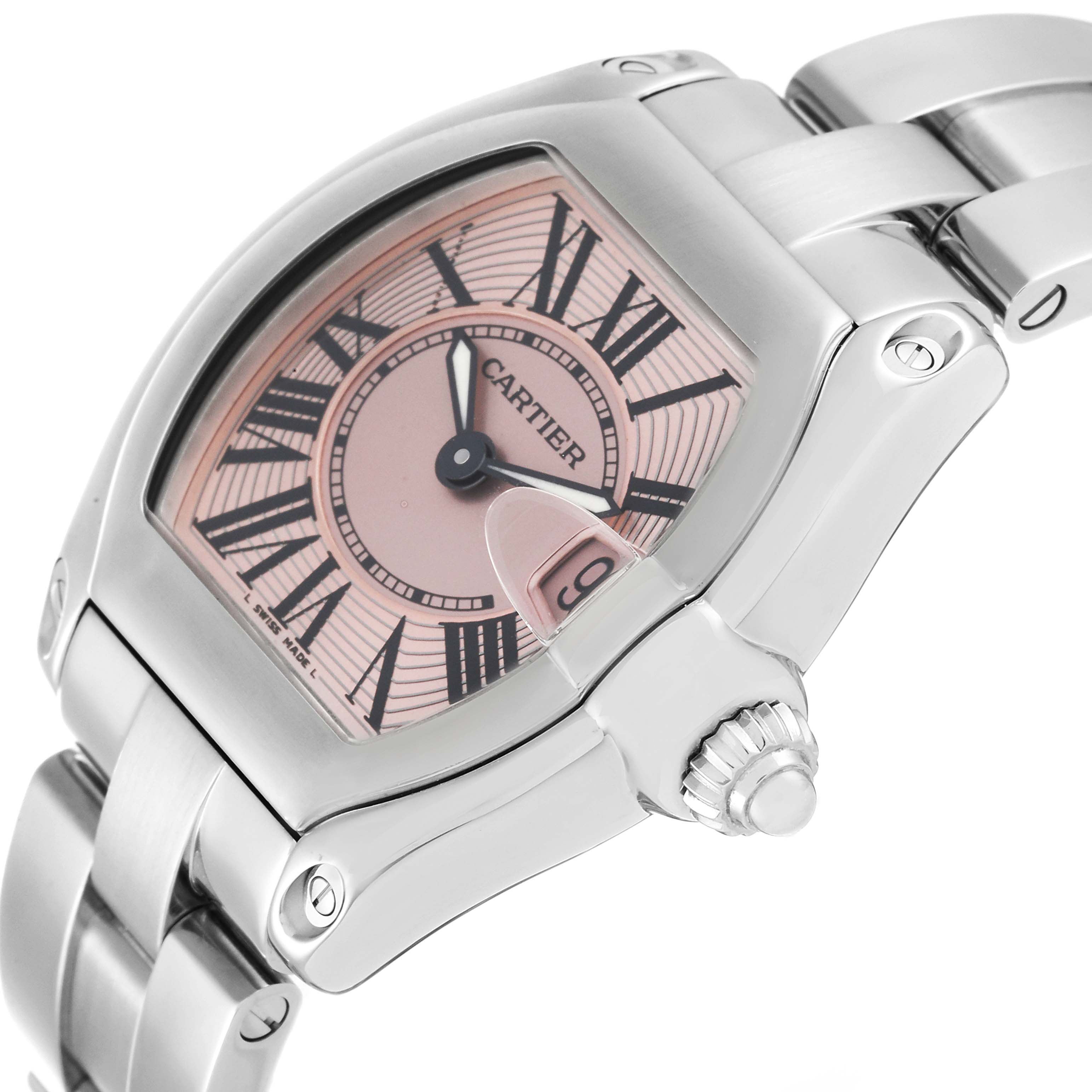 This image shows a close-up of the face and bracelet of a Cartier Roadster W62017V3 Women's Stainless Steel Pink Dial W62017V3 Women's Stainless Steel Pink Dial watch from an angled top-side view.