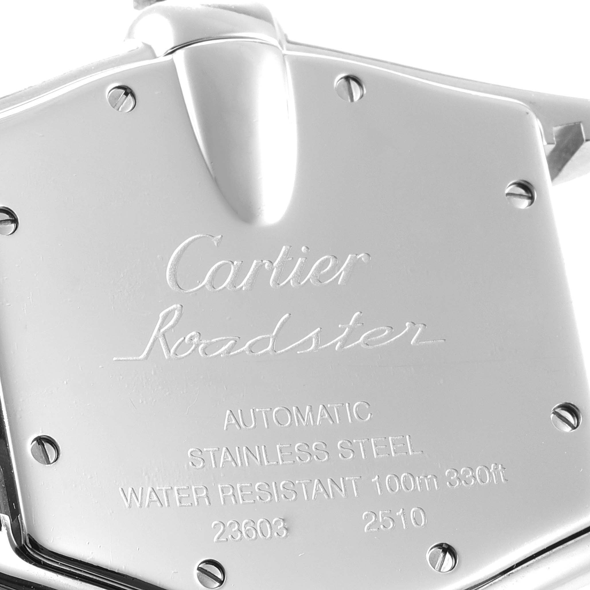 The image shows the back case of a Cartier Roadster W62025V3 Men's Stainless Steel Silver Dial W62025V3 Men's Stainless Steel Silver Dial watch, highlighting its engravings and screws.