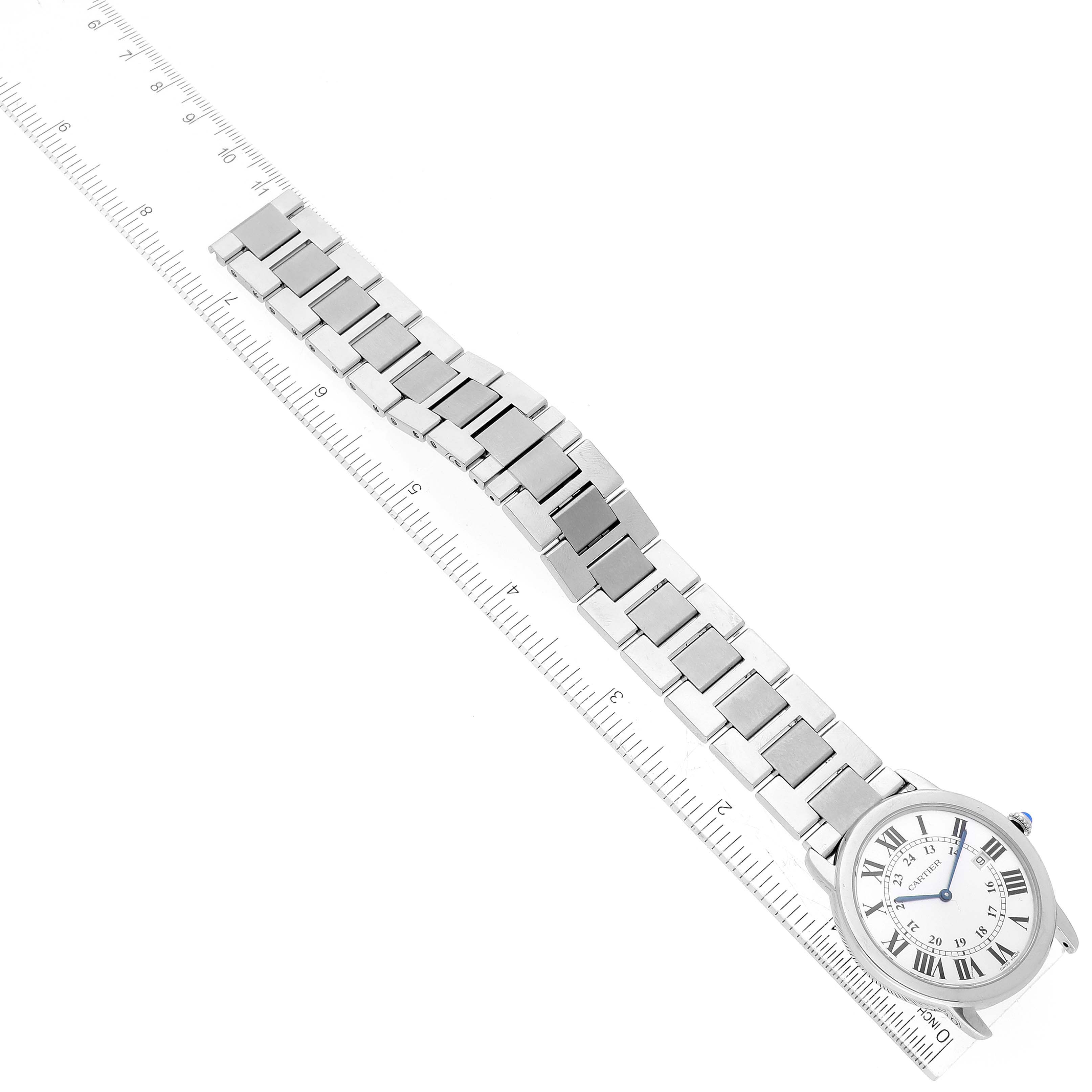 The image shows a Cartier Ronde W6701005 Men's Stainless Steel Silver Dial W6701005 Men's Stainless Steel Silver Dial watch with a silver bracelet, laying flat next to a ruler for scale.
