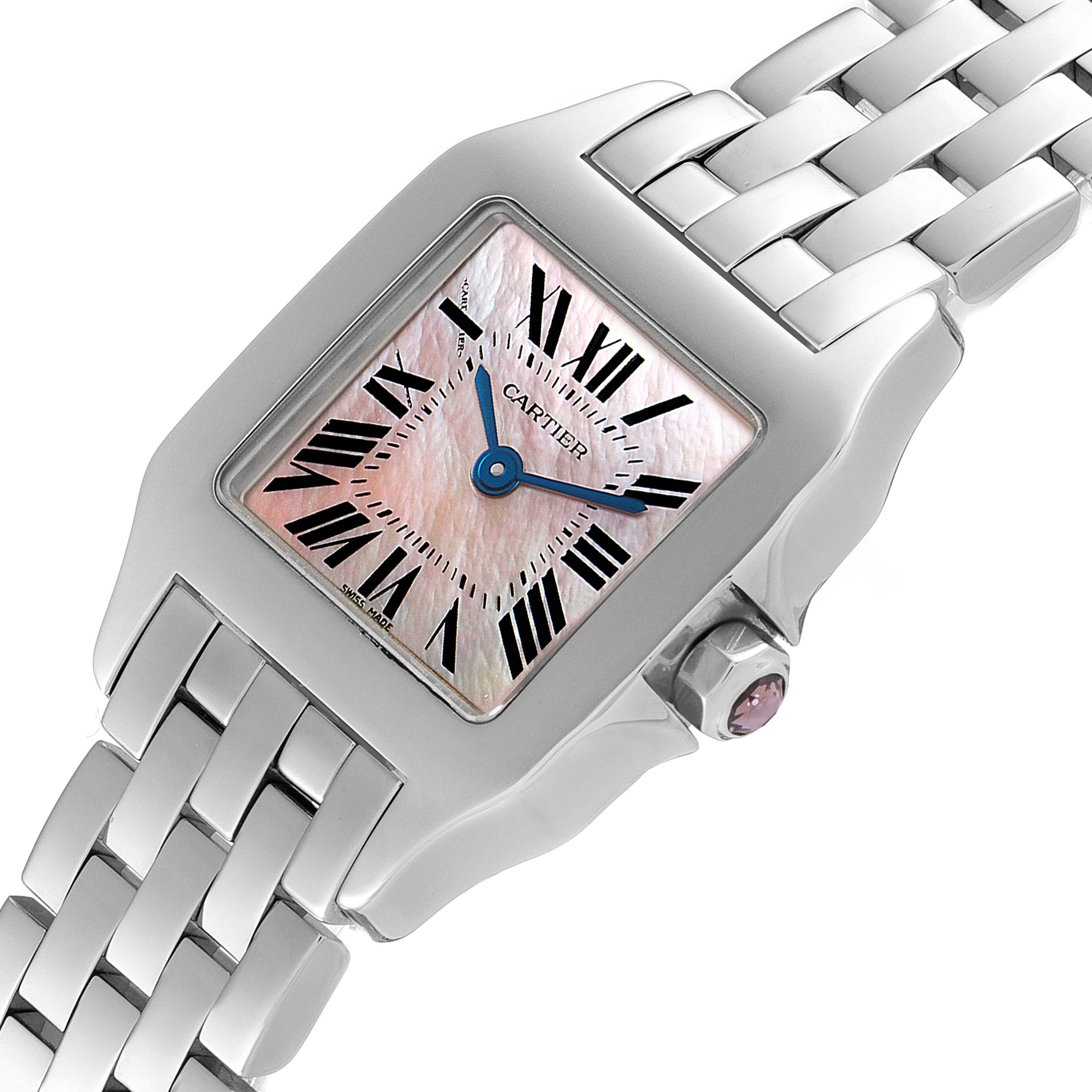 The image shows a close-up of the Cartier Santos Demoiselle W25075Z5 Women's Stainless Steel Mother of Pearl Dial W25075Z5 Women's Stainless Steel Mother of Pearl Dial watch face and part of its metal bracelet at a slight angle.