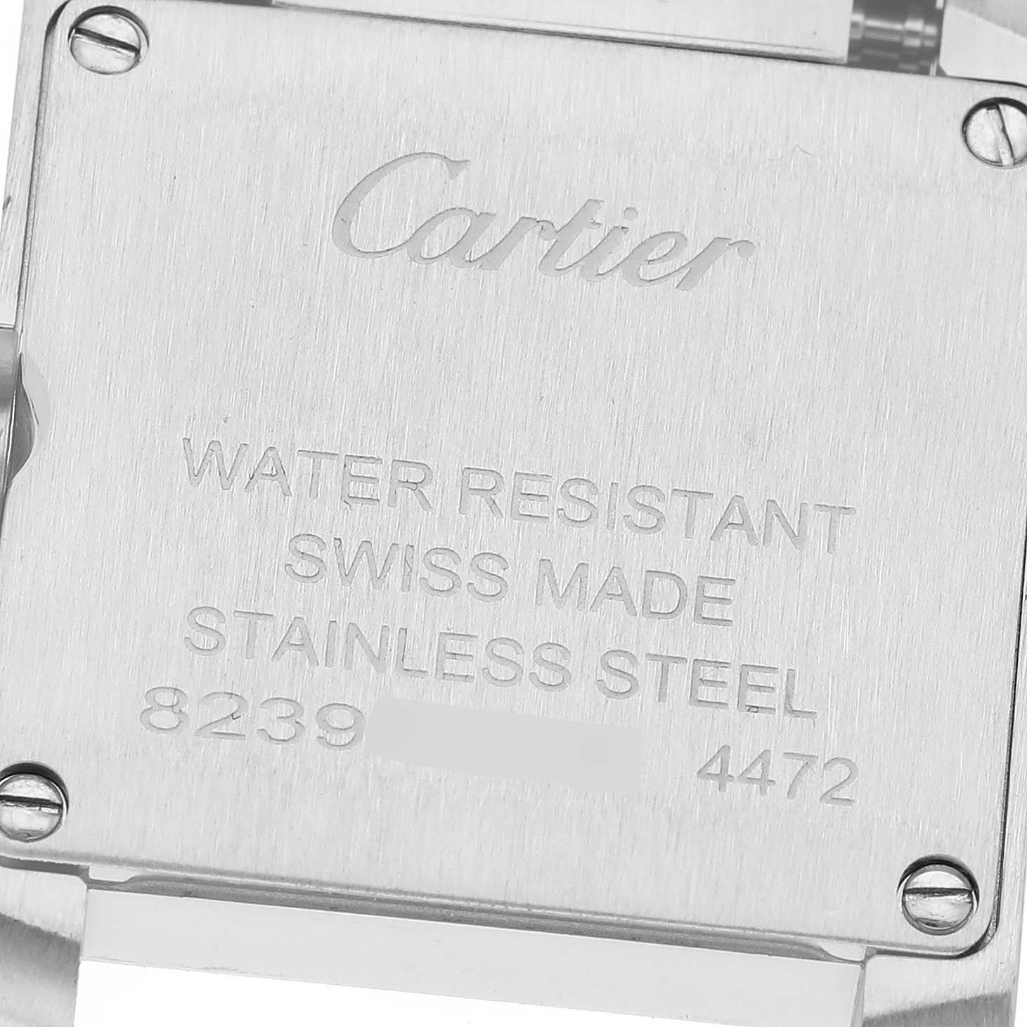 This image shows the back case of a Cartier Tank Francaise WSTA0065 Women
s Stainless Steel Silver Dial WSTA0065 Women
s Stainless Steel Silver Dial watch, highlighting its water resistance, Swiss origin, and material.
