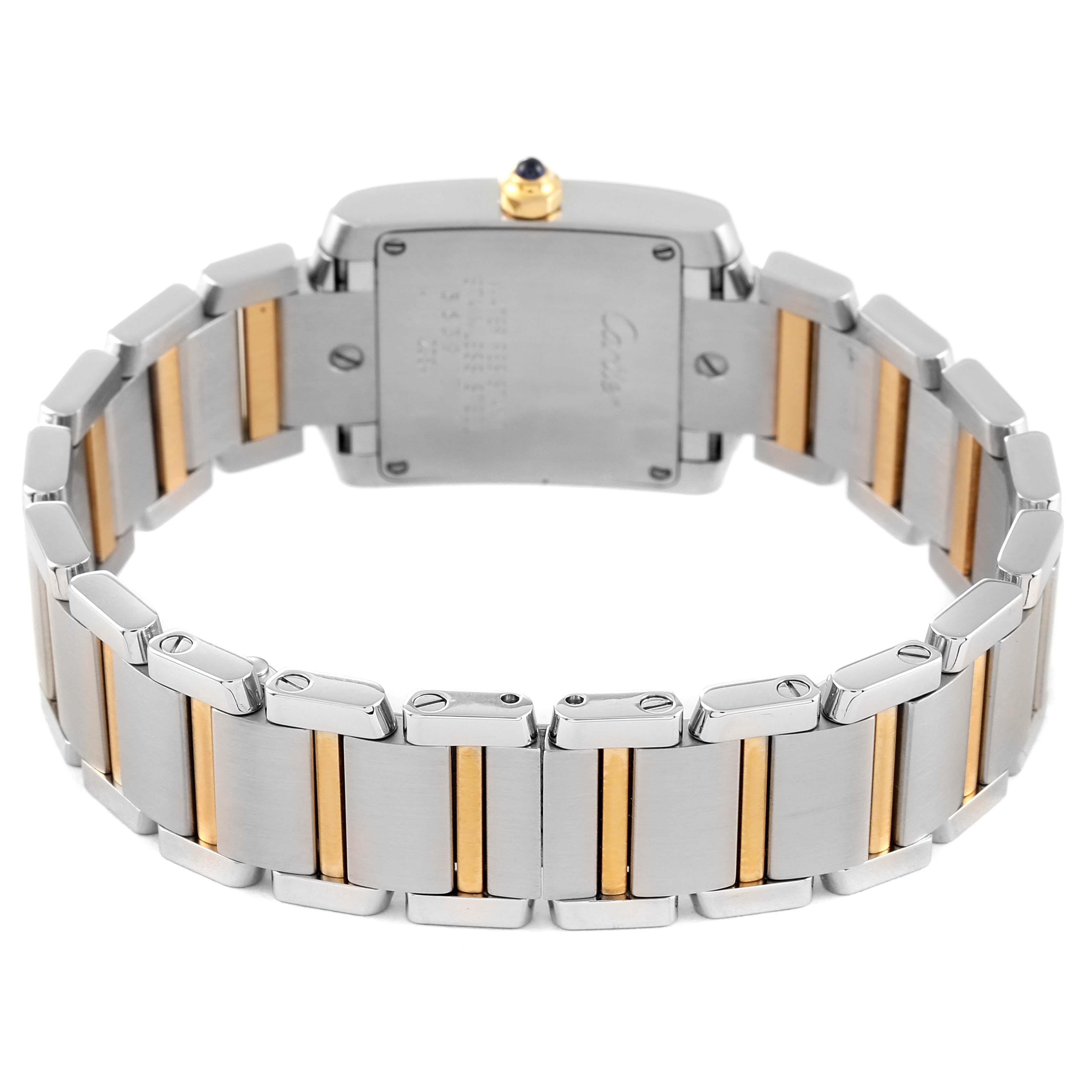 The image shows the back view of the Cartier Tank Française watch, highlighting its metal bracelet and case back.