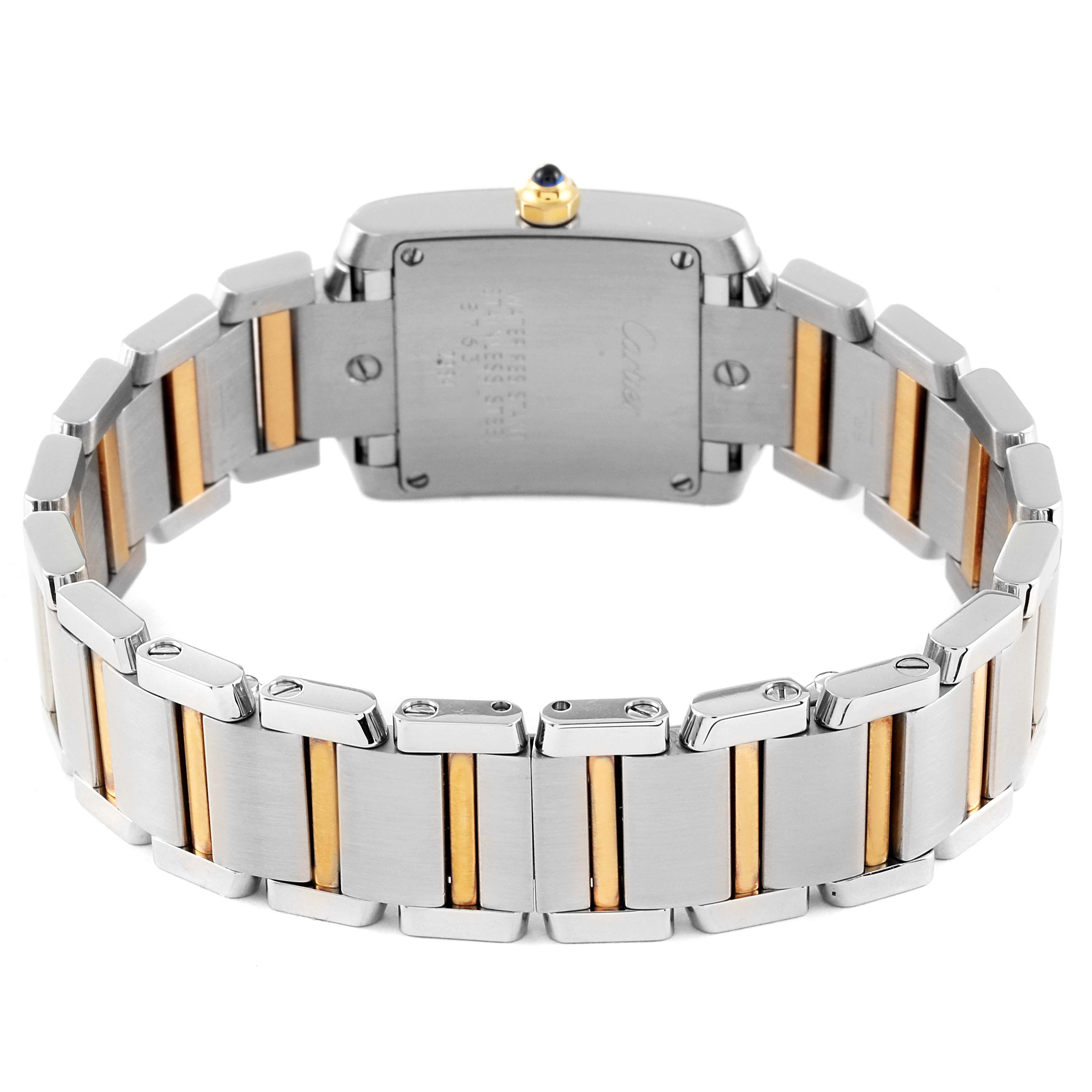 The image shows the back of the Cartier Tank Francaise W51007Q4 Women's Steel and Gold (two tone) Silver Dial W51007Q4 Women's Steel and Gold (two tone) Silver Dial watch, highlighting the case back and the stainless steel bracelet.