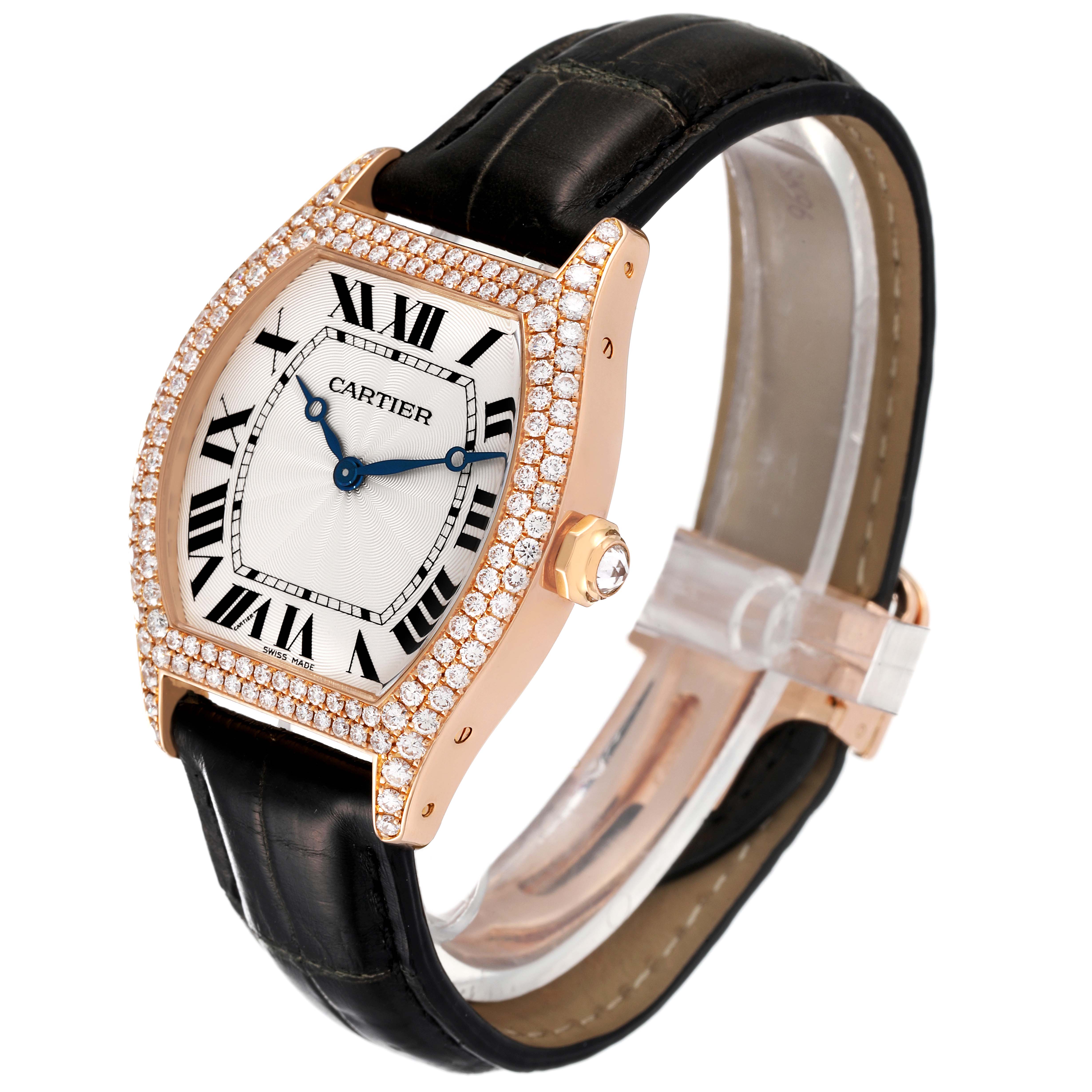 The image shows a side angle of the Cartier Tortue WA503751 Women's Rose Gold Silver Dial WA503751 Women's Rose Gold Silver Dial watch, highlighting its face, bezel with diamonds, strap, and crown.